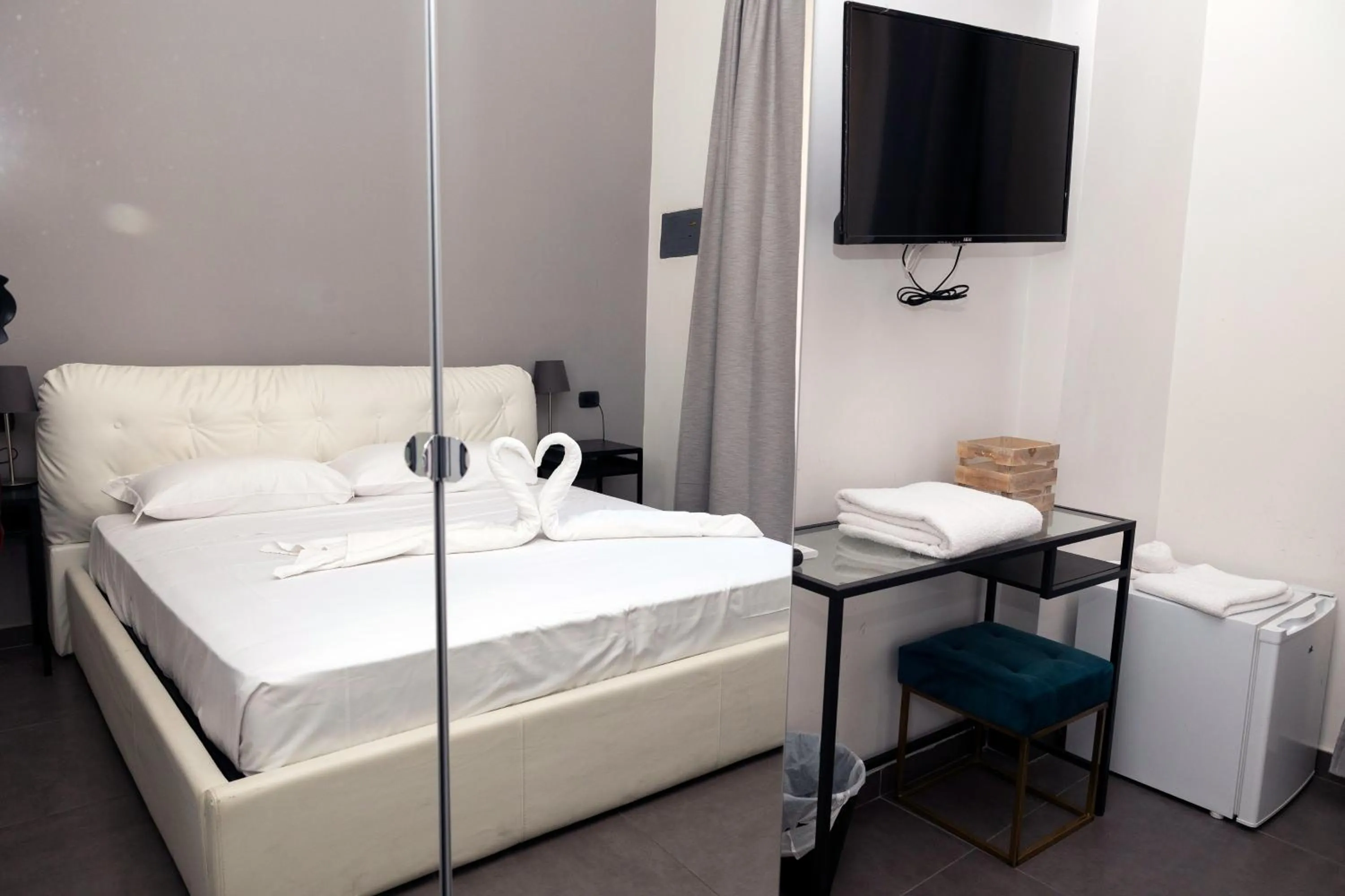 Bed in Doria Suites Napoli