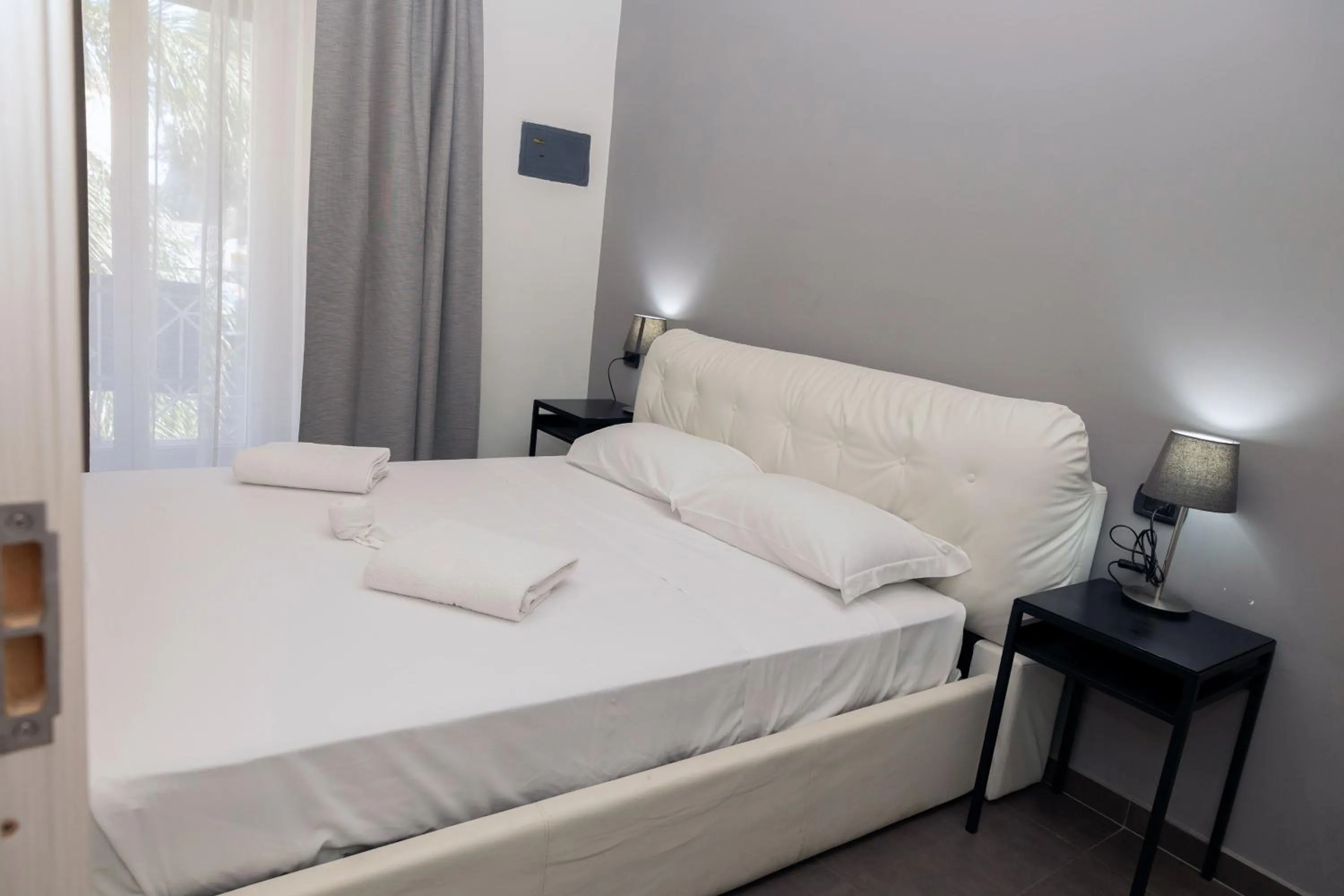 Bed in Doria Suites Napoli