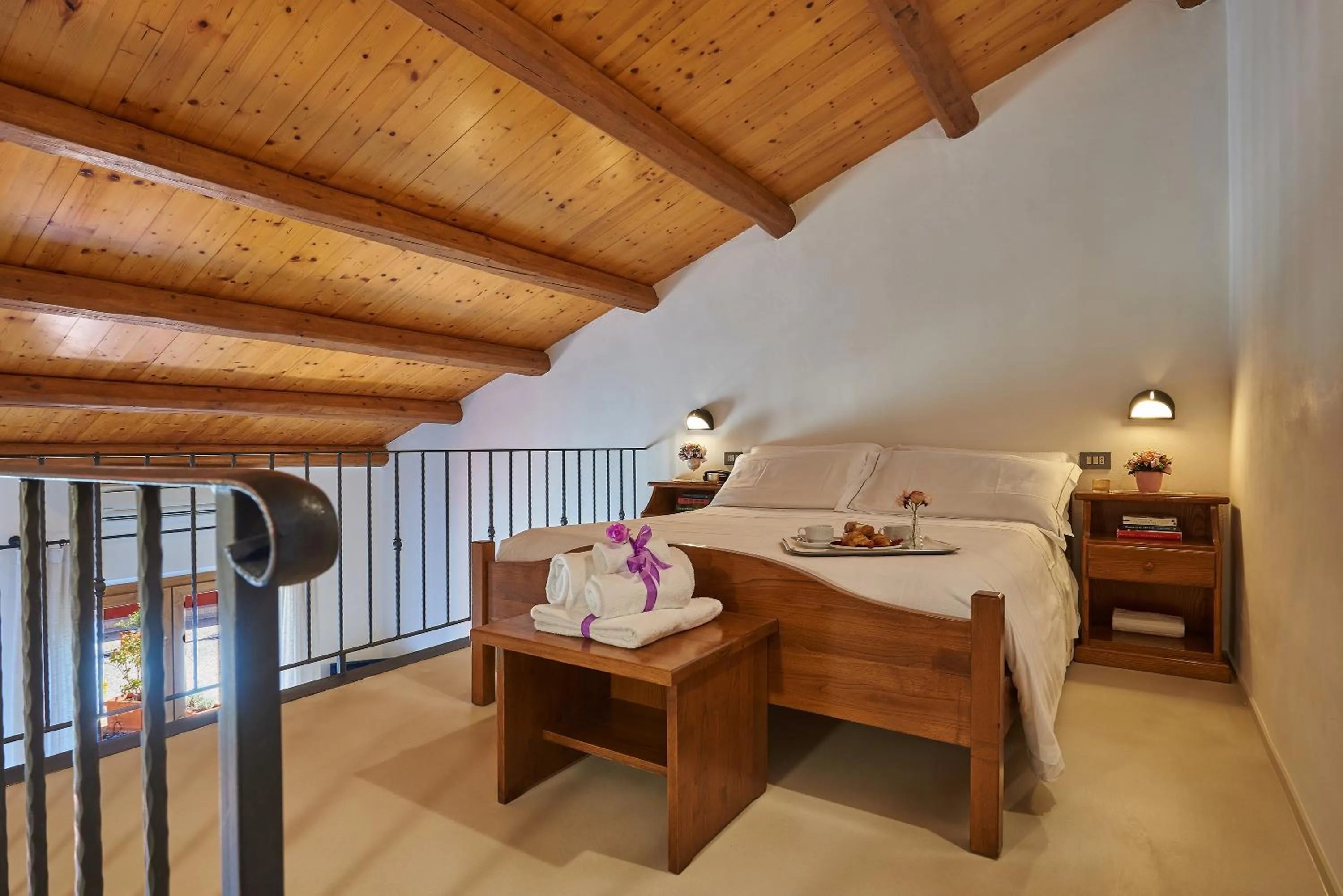 Bed in Casanova - Panoramic Rooms and Suites