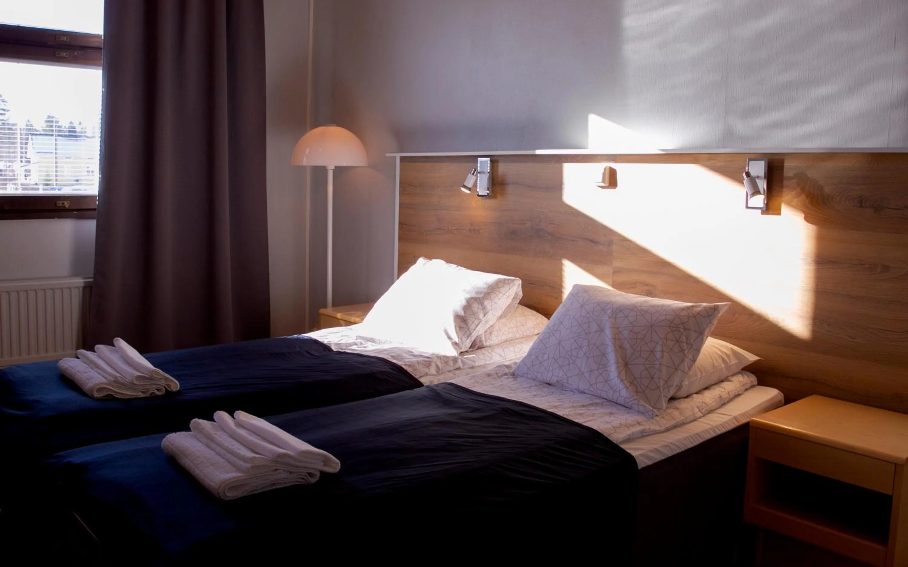 Photo of the whole room, Bed in Hotelli Peltohovi