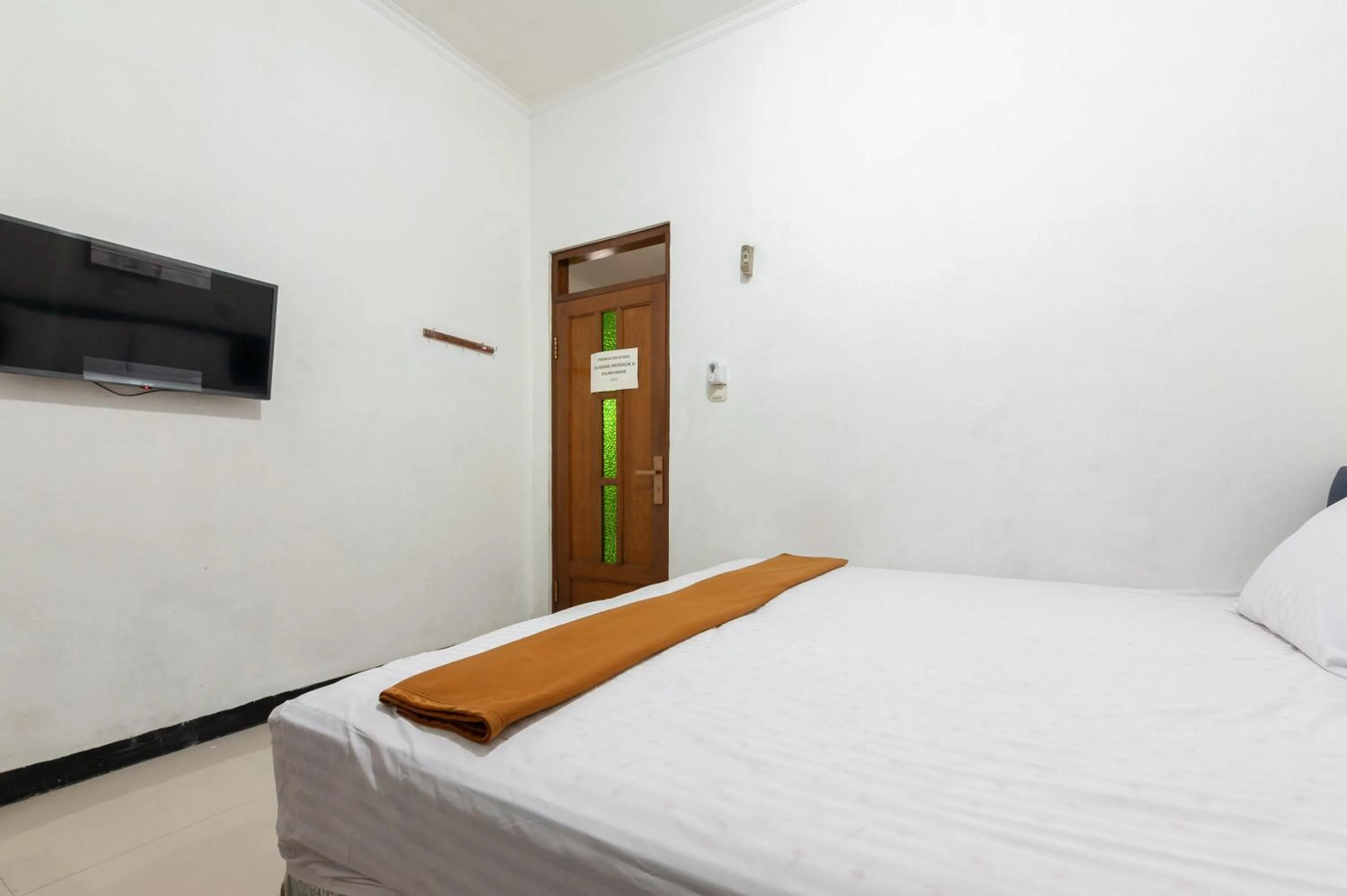 Bed in RedDoorz at Batutulis Bogor by House of M