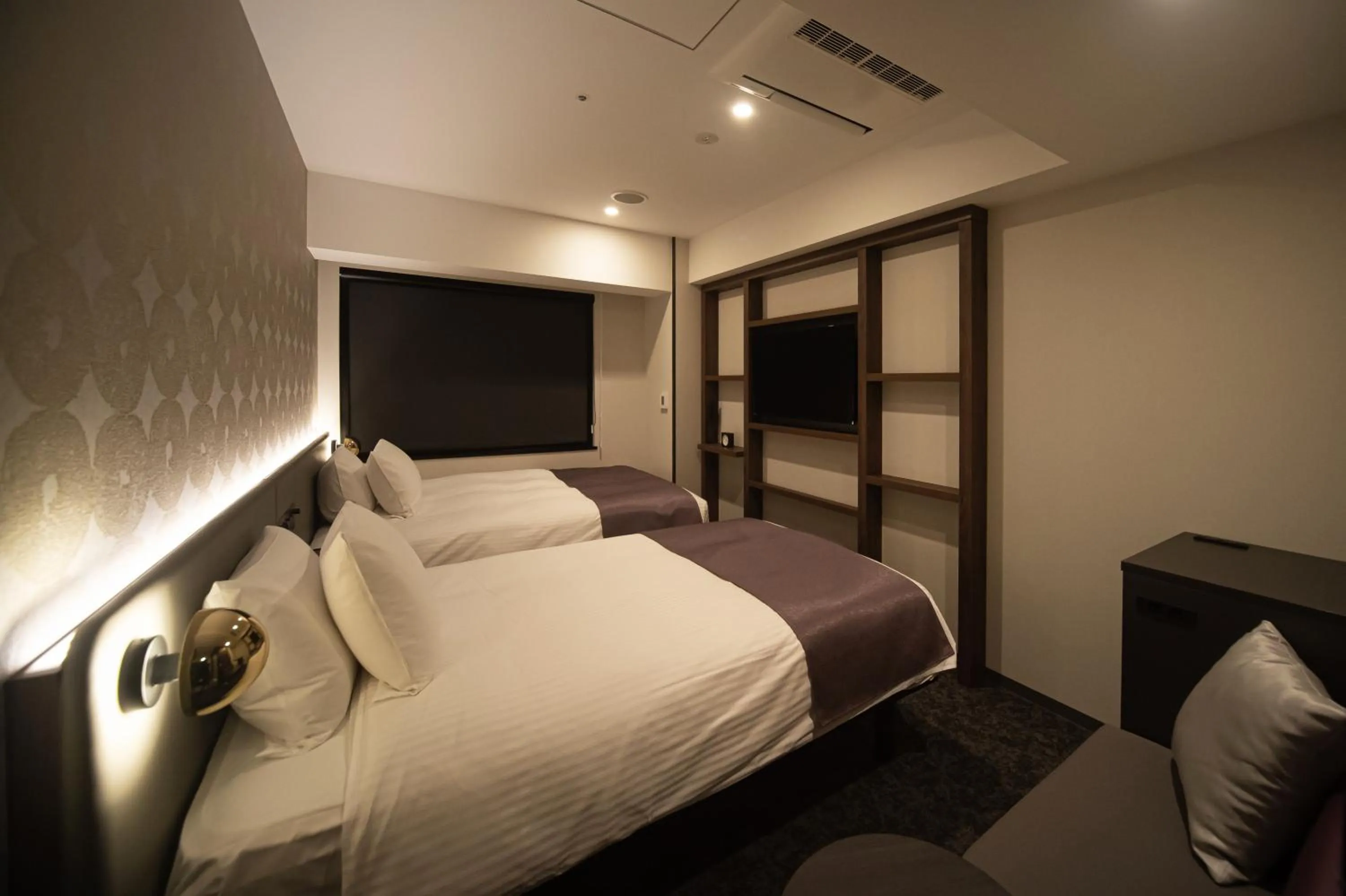 Bed in GRIDS PREMIUM HOTEL OSAKA NAMBA