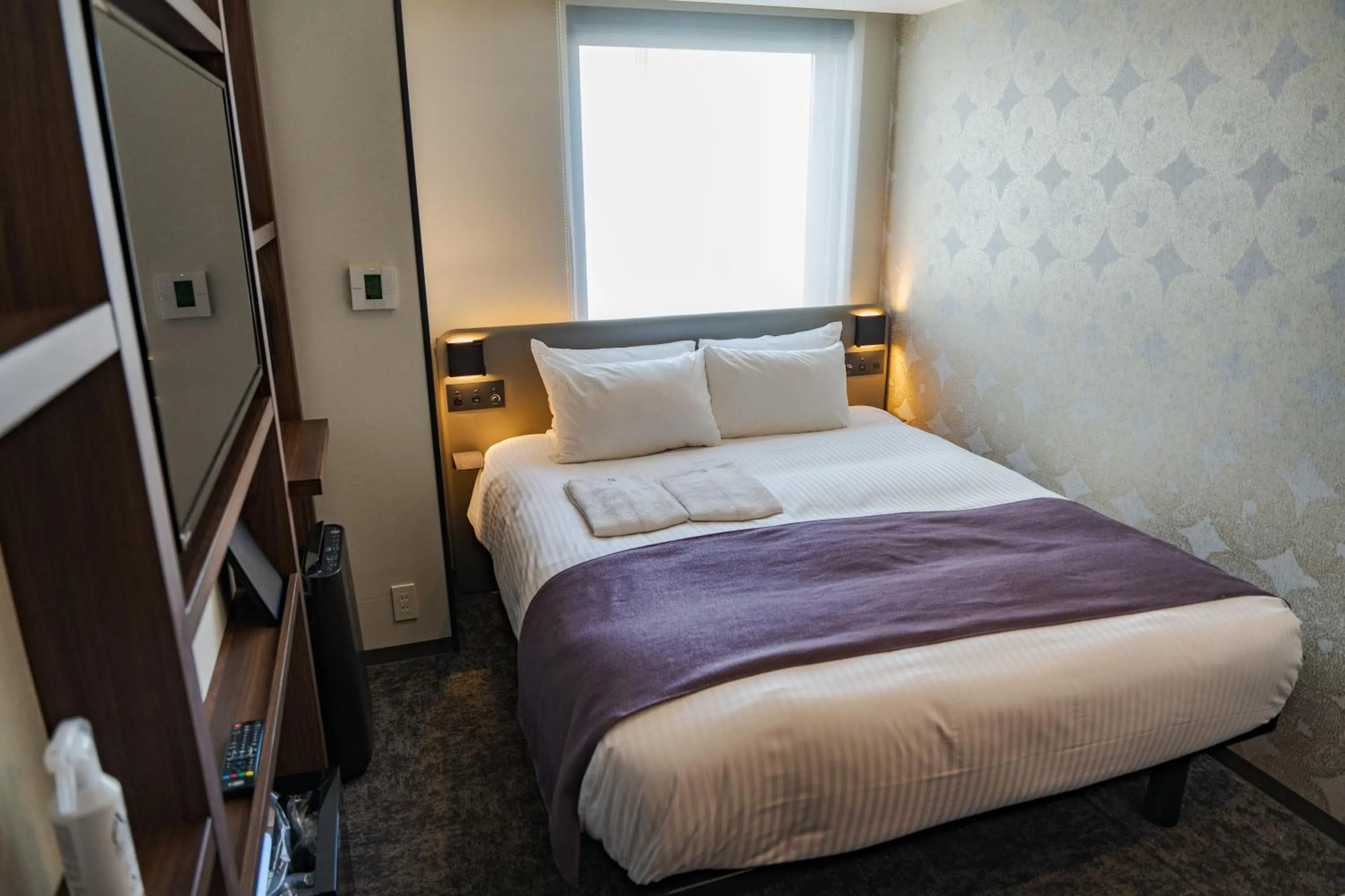 Bed in GRIDS PREMIUM HOTEL OSAKA NAMBA