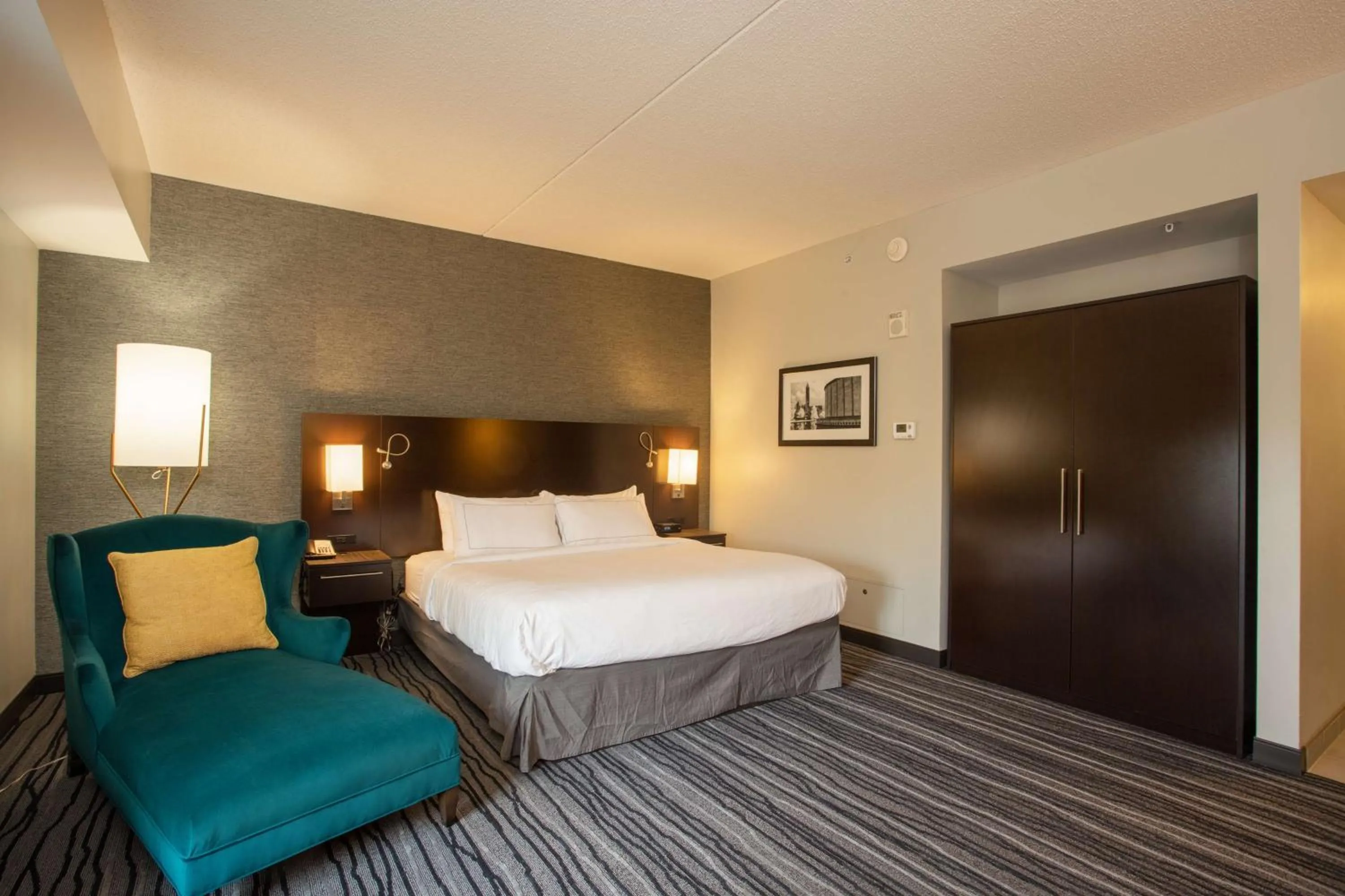 Bed in The Mosey Buffalo Williamsville Tapestry Collection Hilton