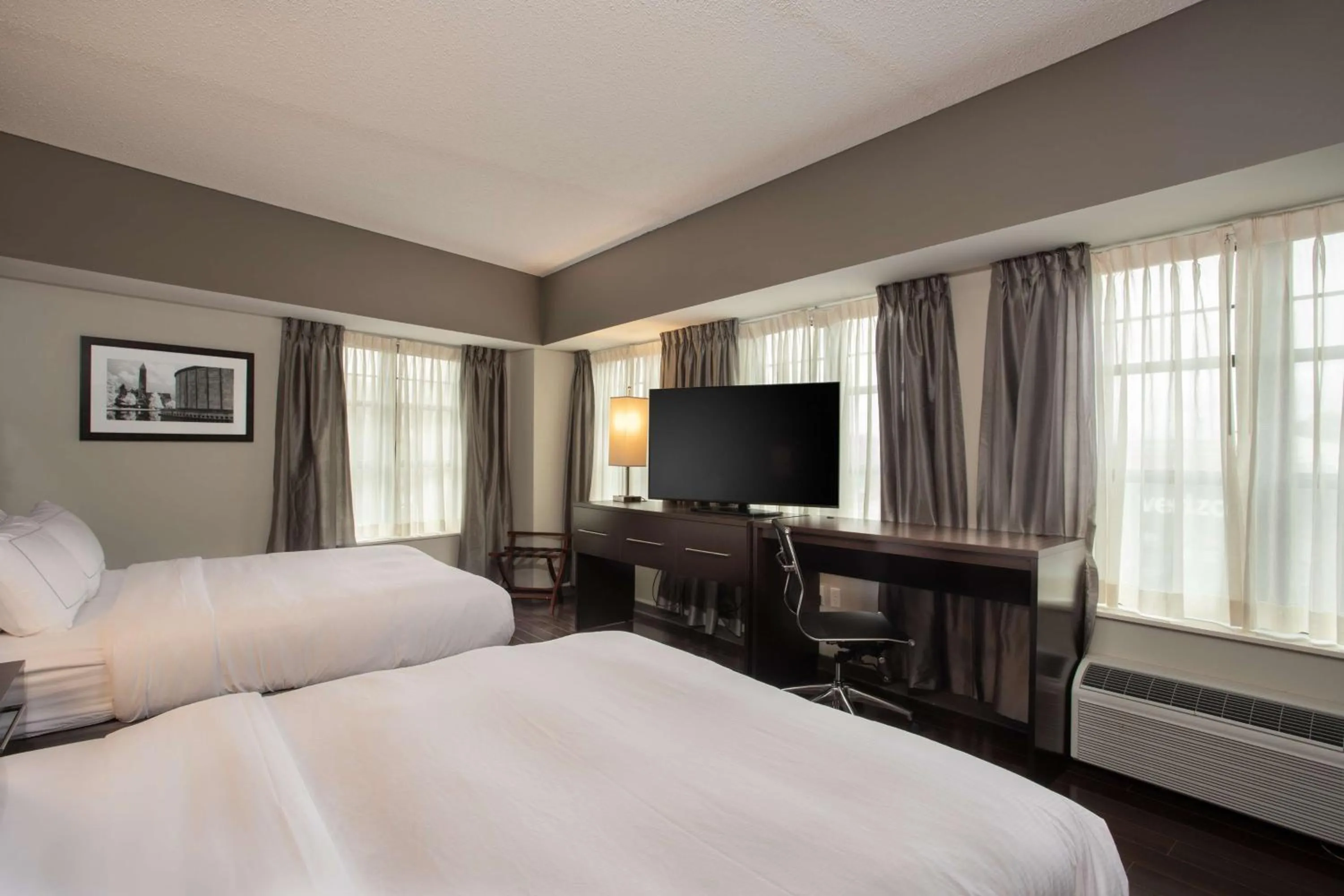 Bed in The Mosey Buffalo Williamsville Tapestry Collection Hilton