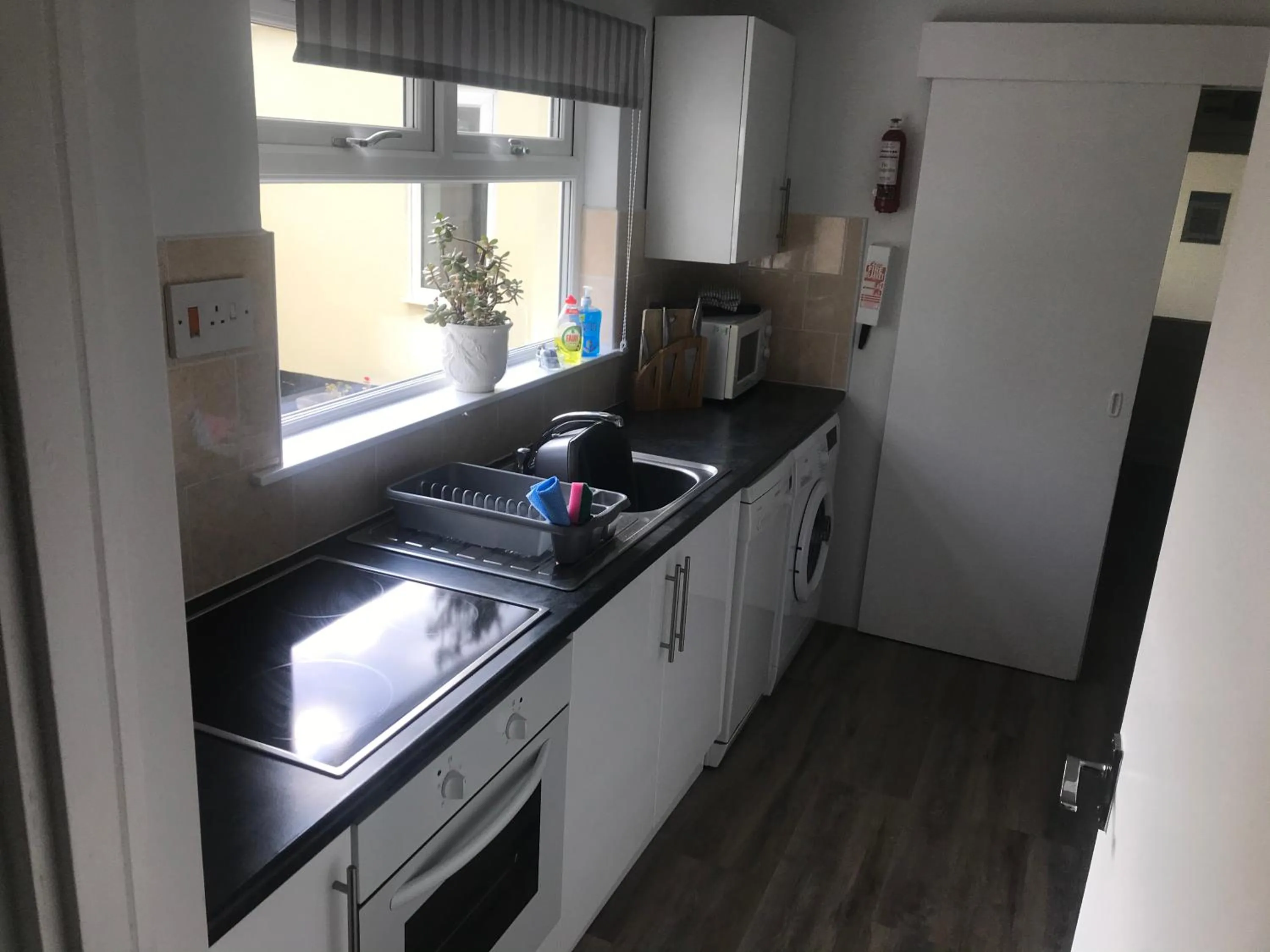 Kitchen or kitchenette in Sennen Cove Cottage