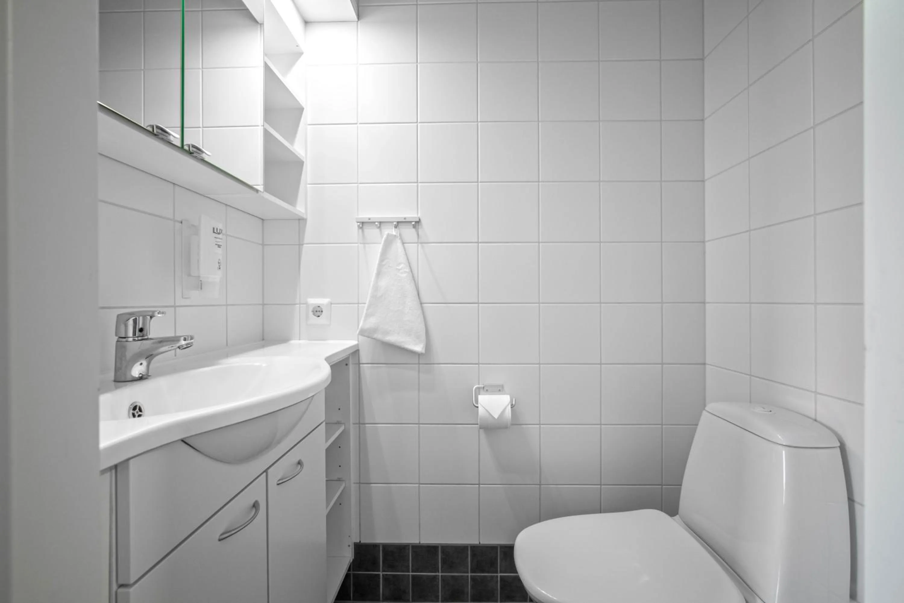 Toilet in Ski-Inn RukaSuites