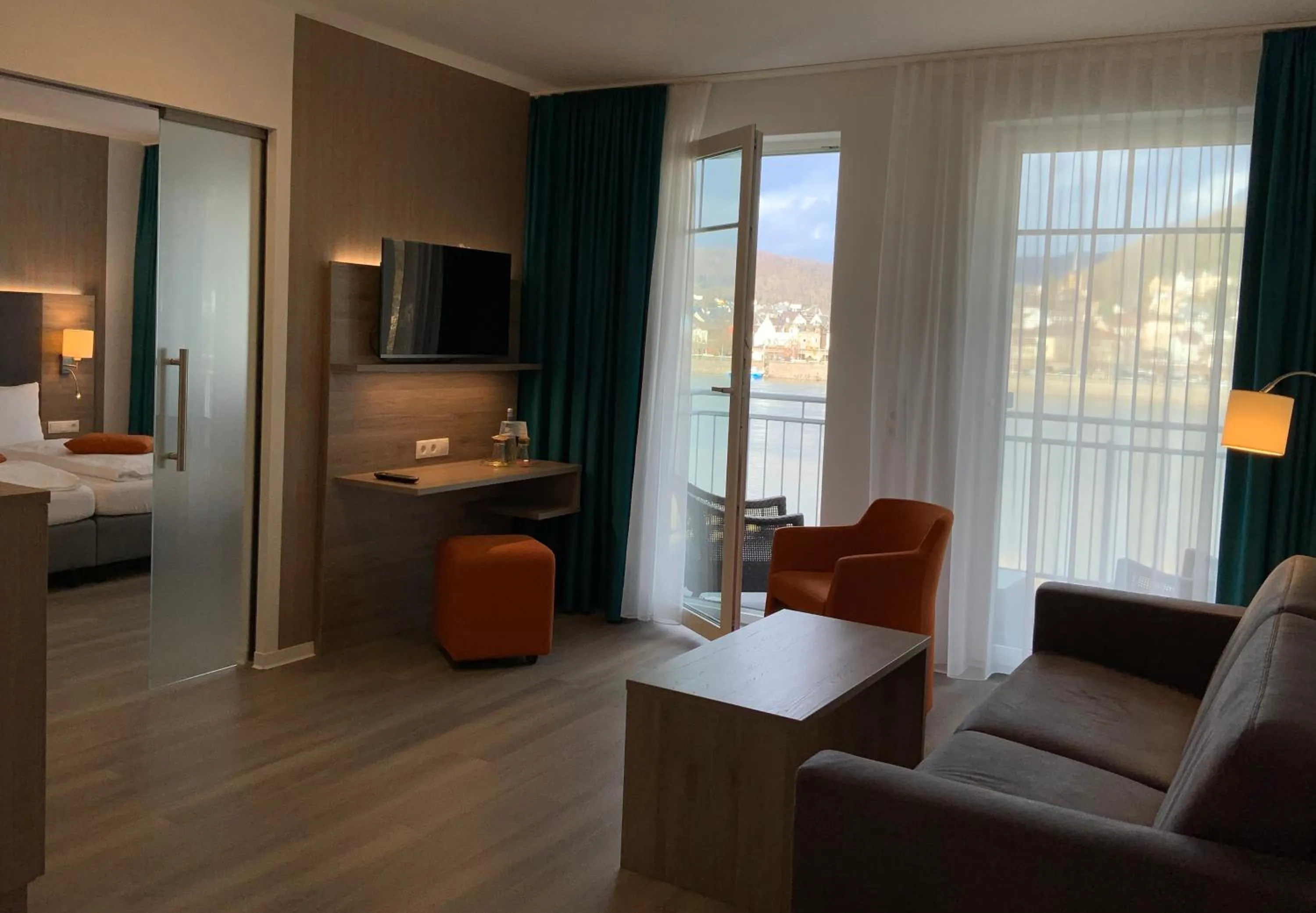 Living room, Bed in RheinVilla ARTE