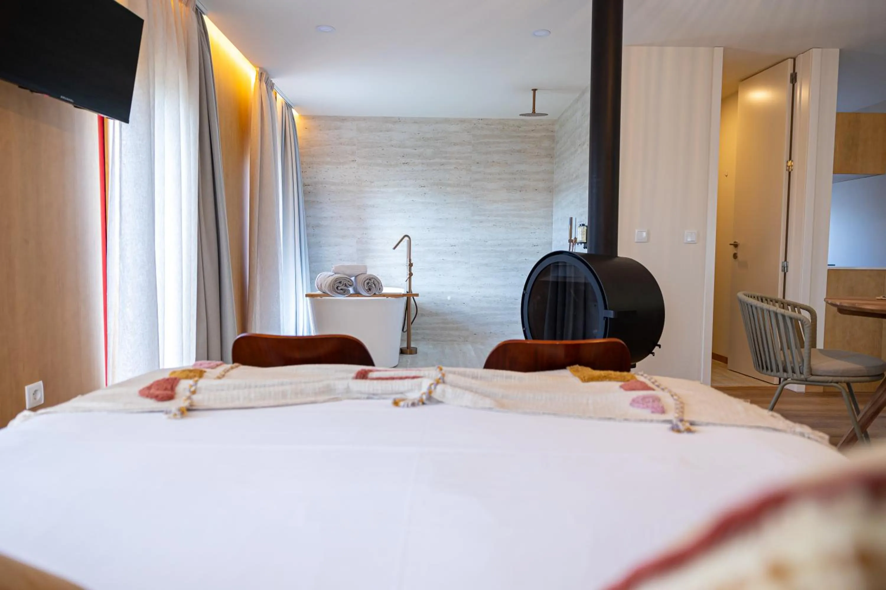 Photo of the whole room, Bed in Peso Village