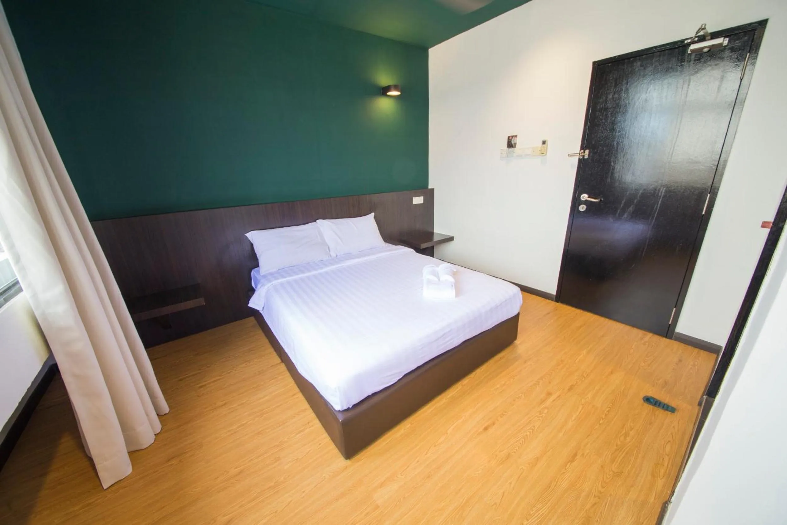 Bed in Room V Jalan Jenang by SECOMS