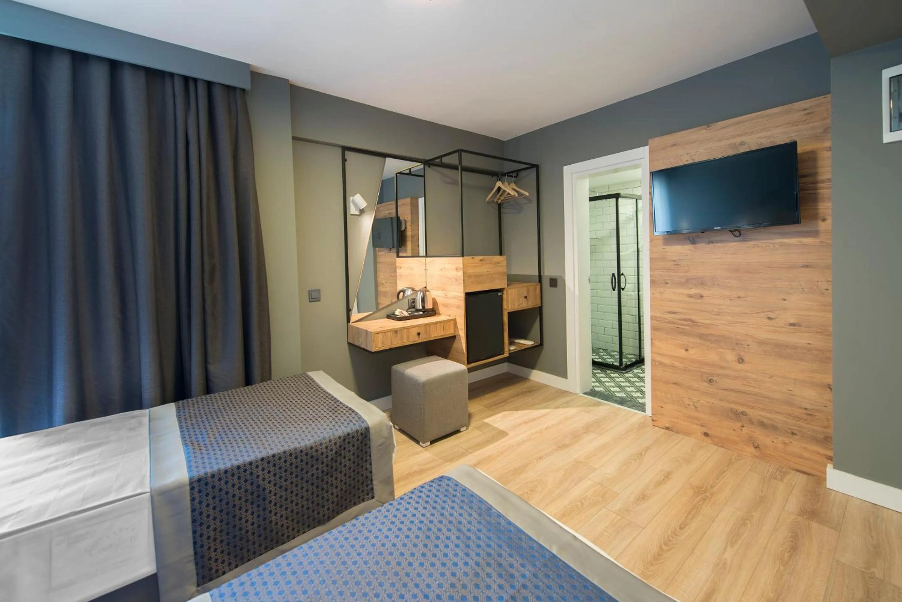 Communal lounge/ TV room, Bed in Pure Blanche Hotel