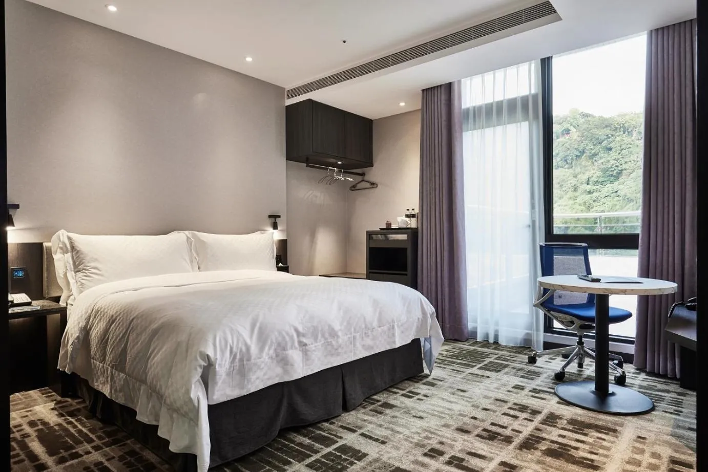 Bed in The Tango Hotel Taipei Shilin