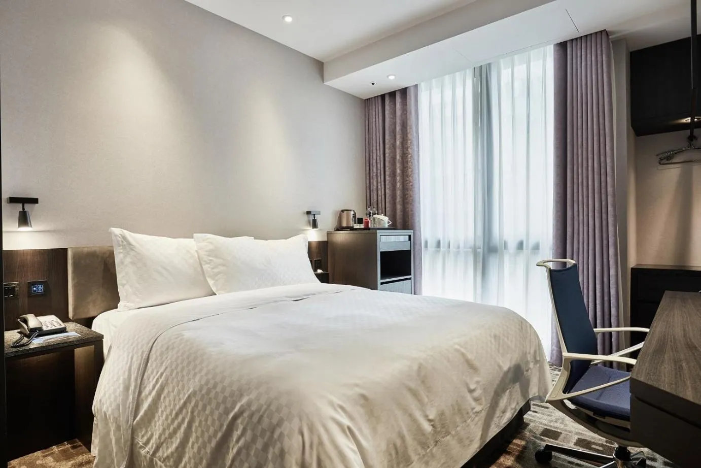 Bed in The Tango Hotel Taipei Shilin