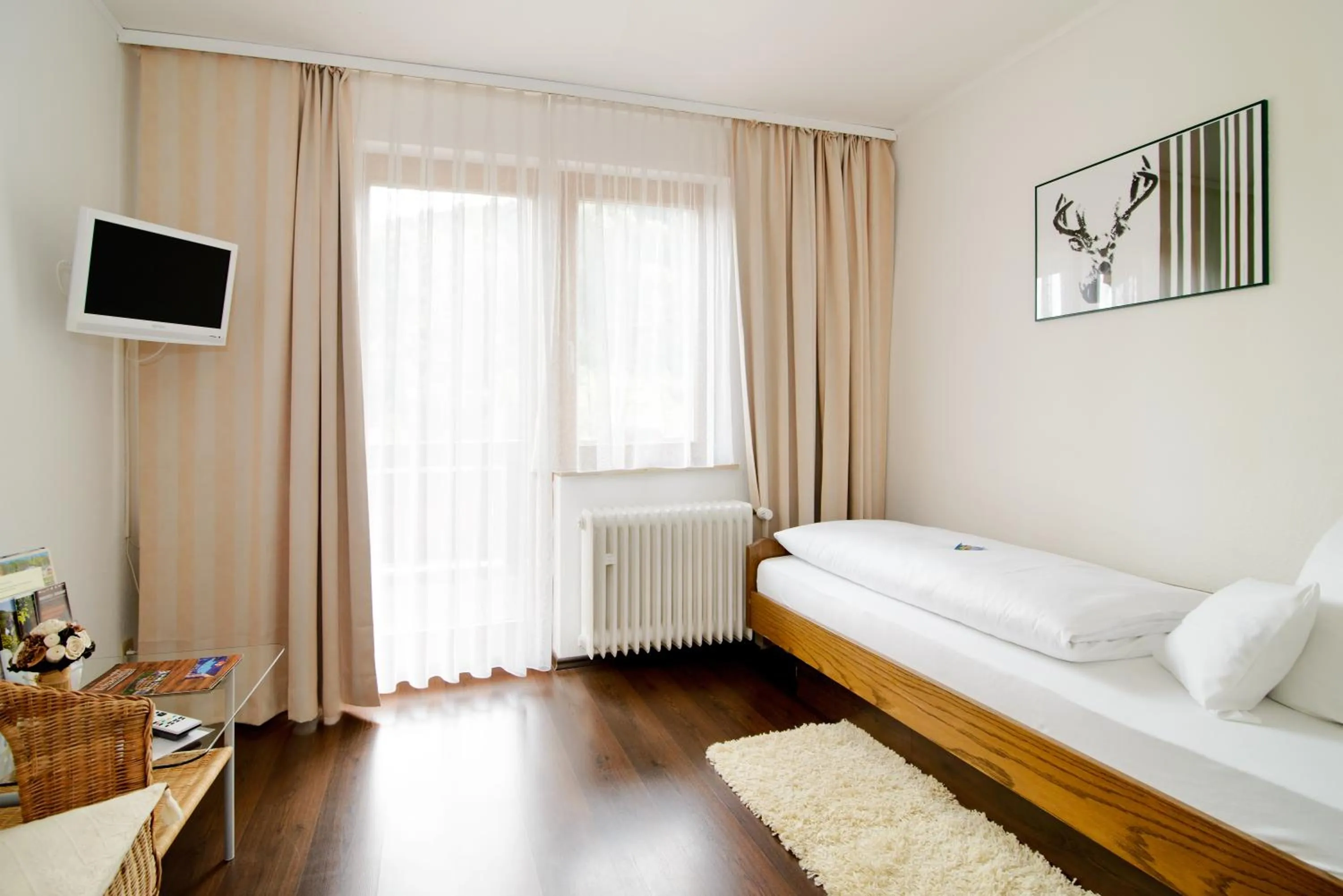 Day, Bed in Holzschuhs Schwarzwaldhotel