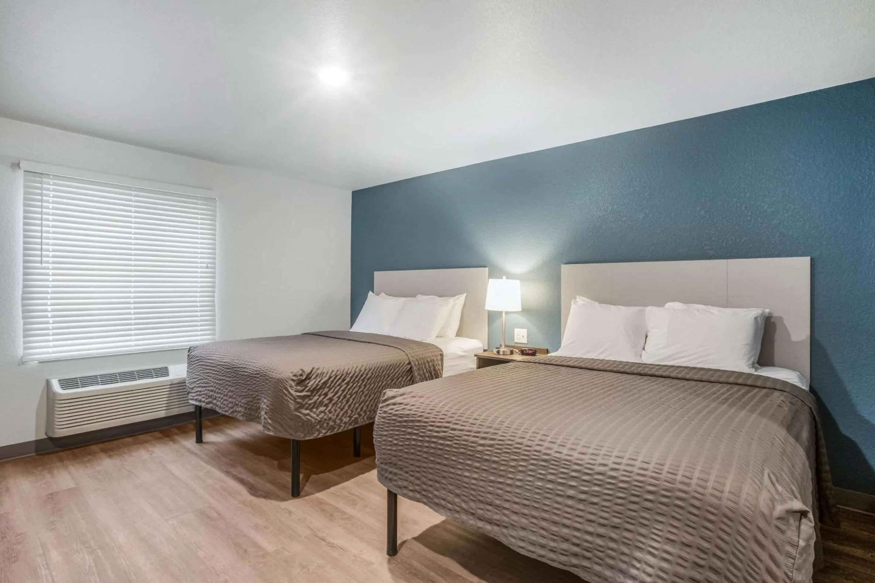 Photo of the whole room, Bed in WoodSpring Suites Atlanta McDonough