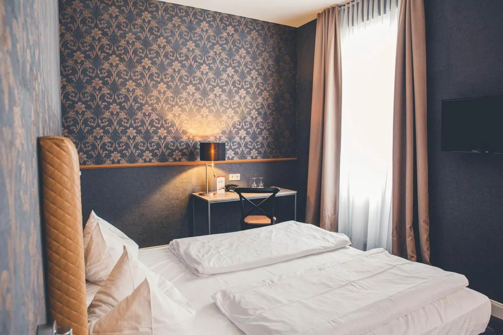 Bed in Hotel Deutschherrenhof