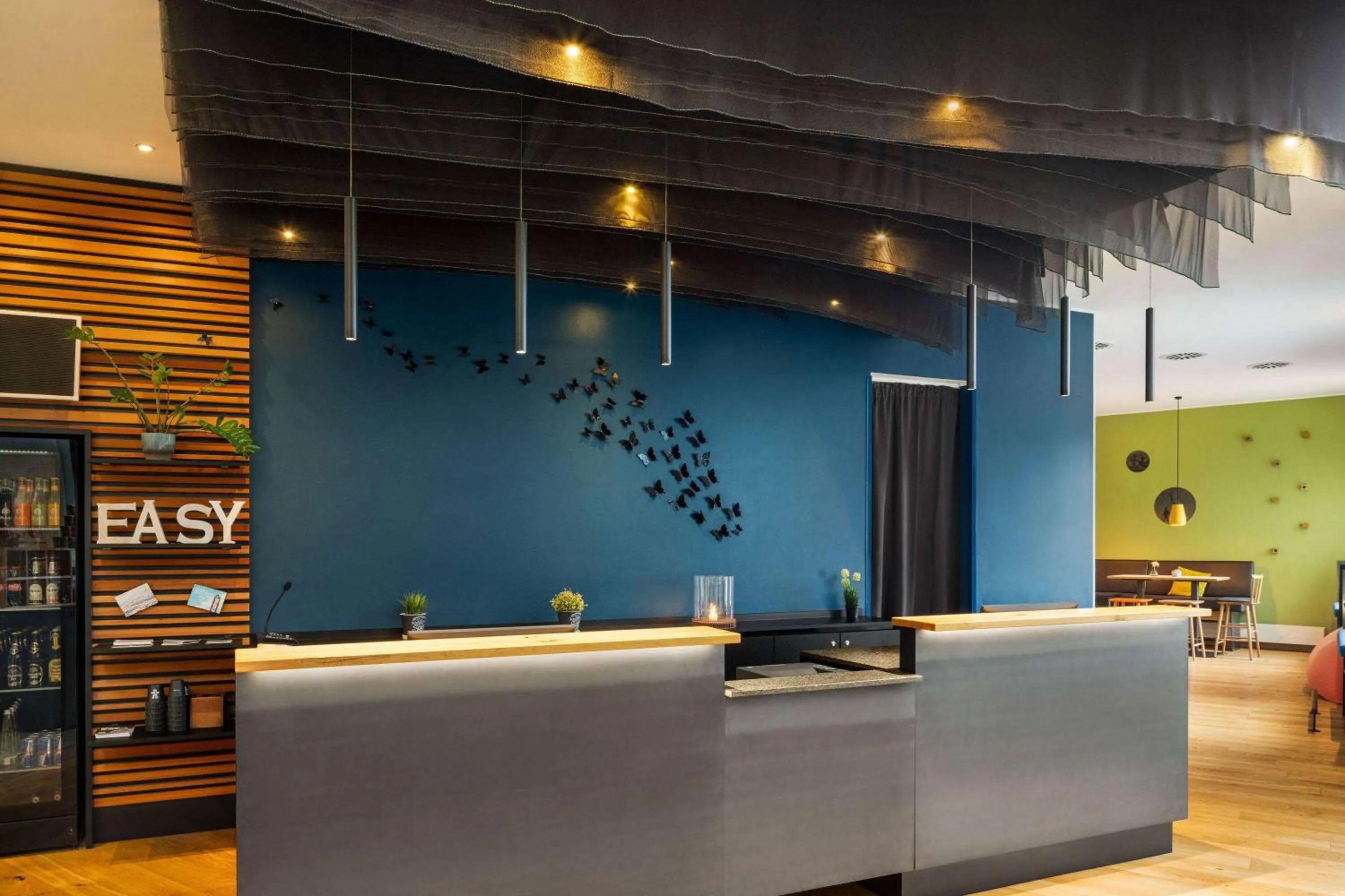 Lobby or reception in Vienna House Easy by Wyndham Landsberg