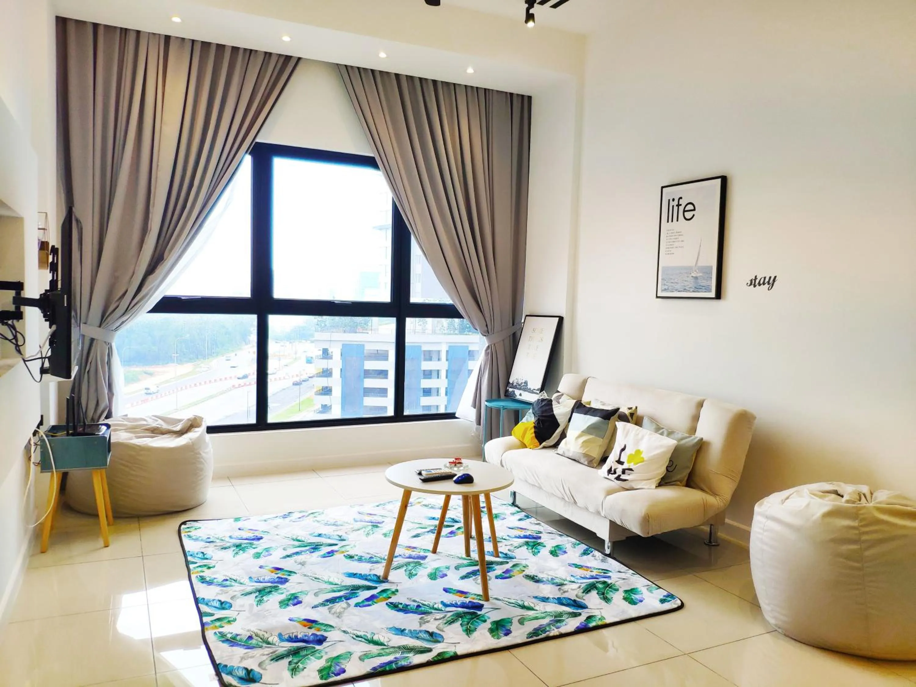 Living room in Le Pavilion by Salaam Suites, 5 pax, near Setiawalk