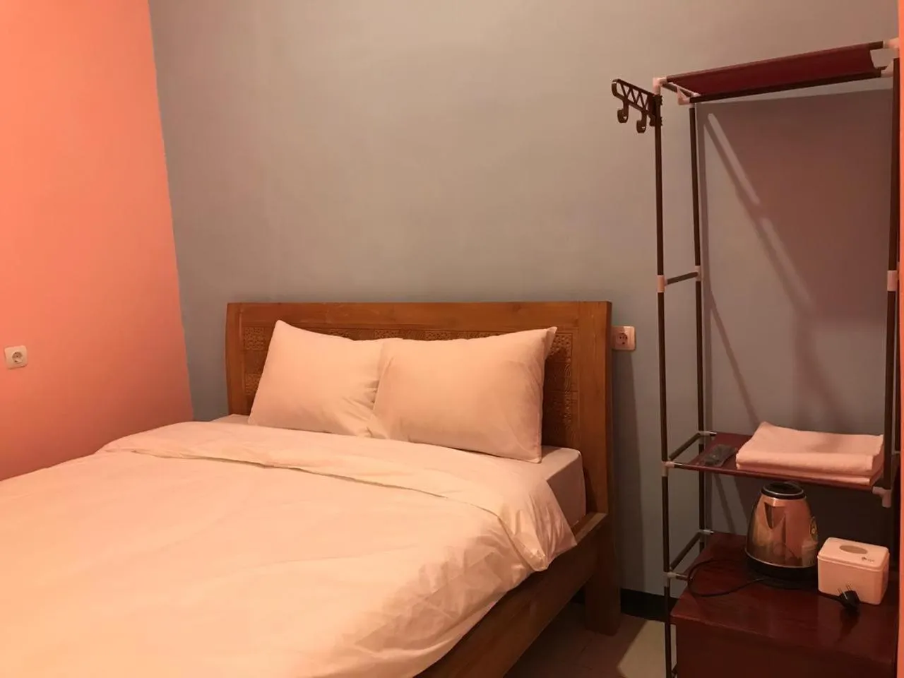 Bed in RoomZ Budget Residence