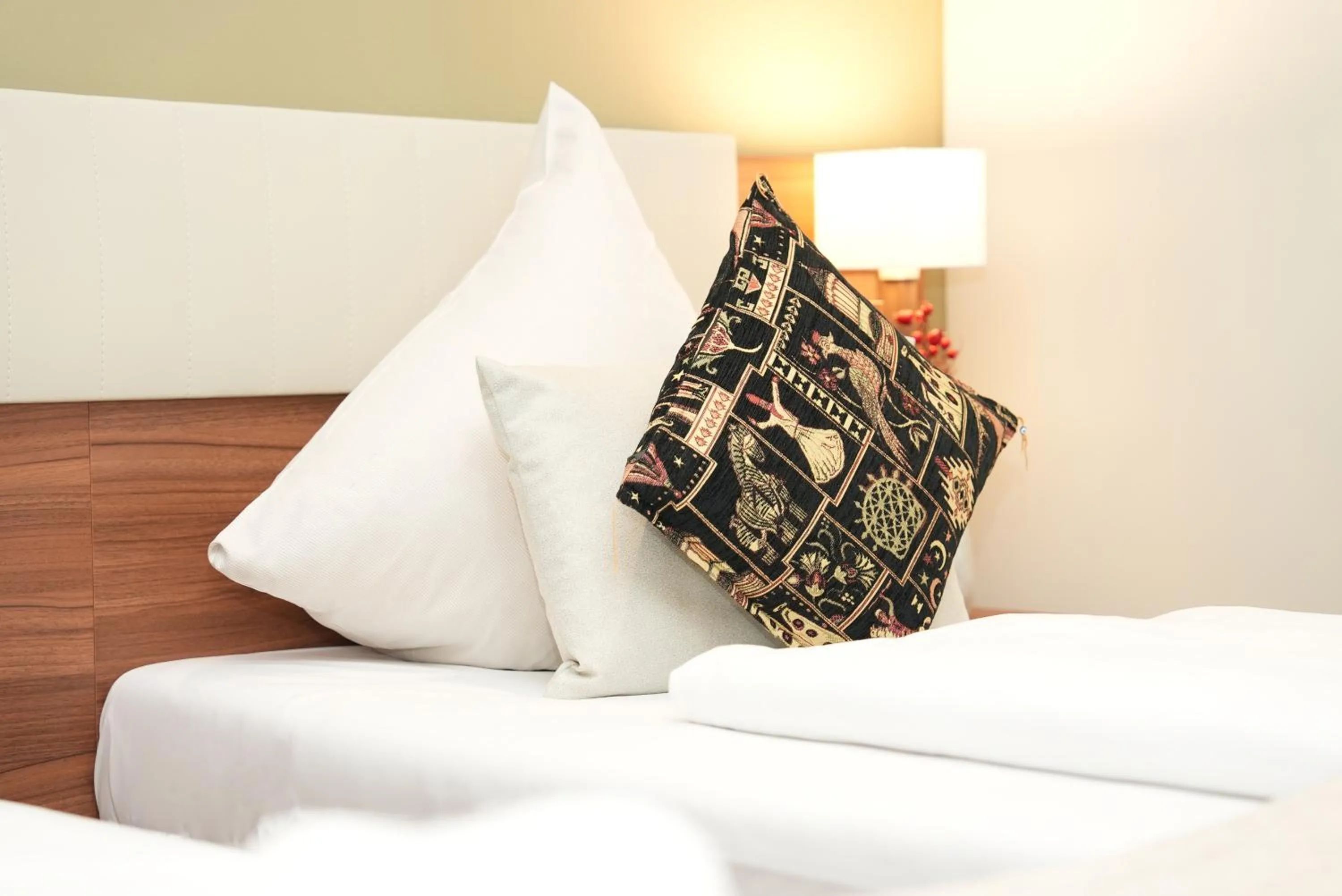 Bed in Hotel Attaché an der Messe