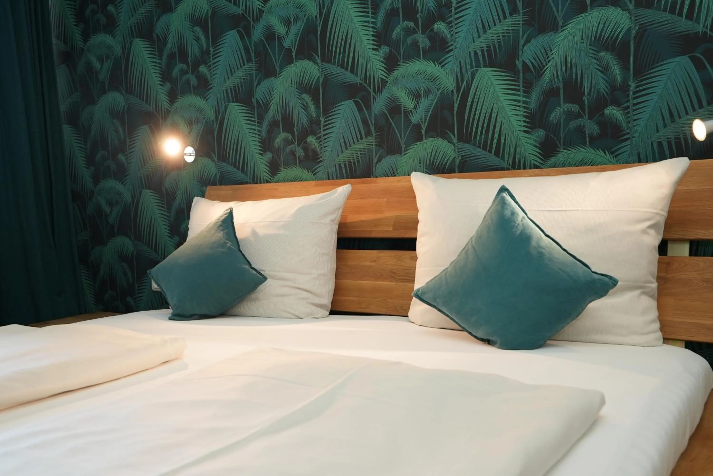 Bed in Hotel Attaché an der Messe