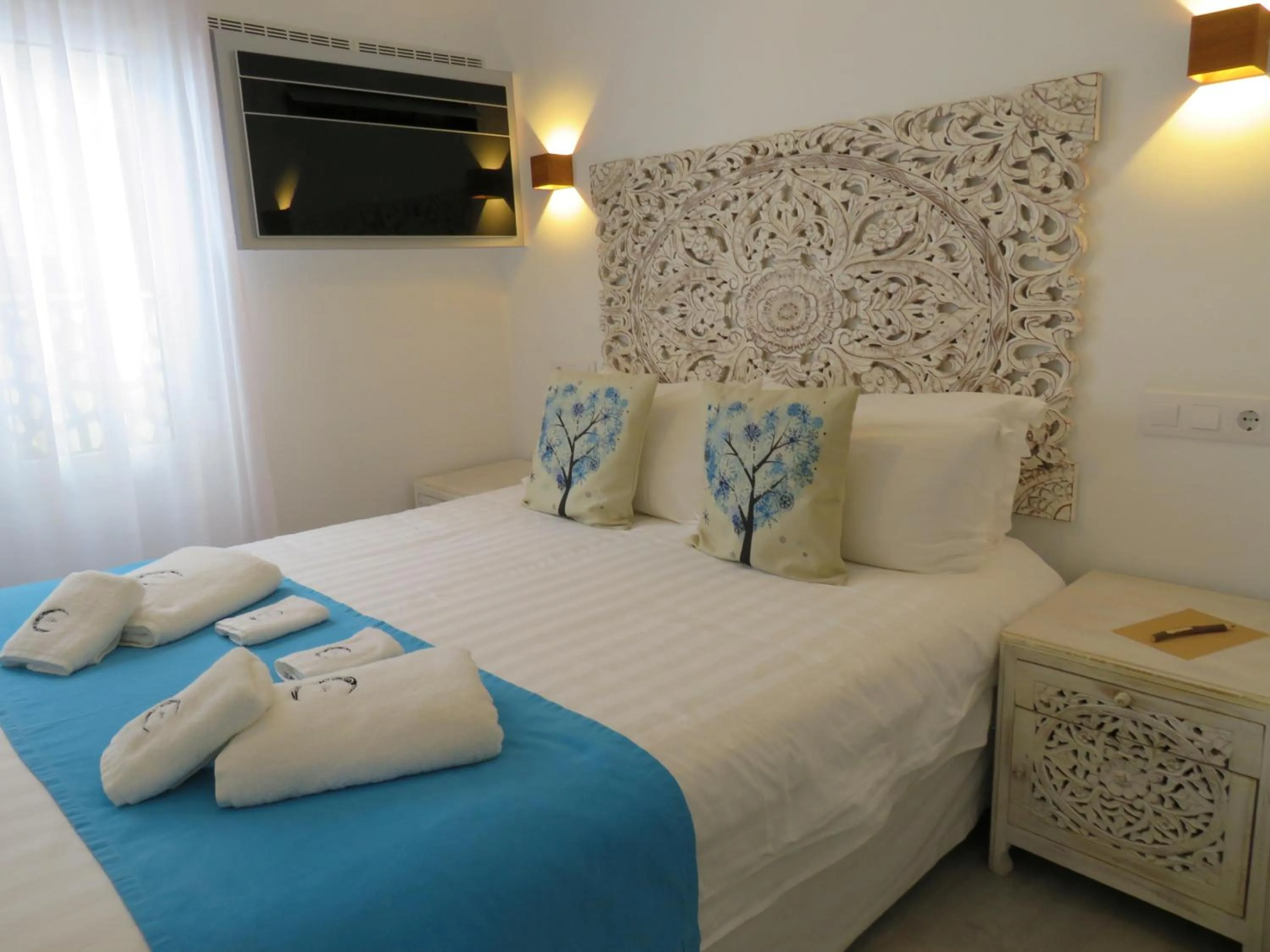 Bed in Lua Hotel Boutique