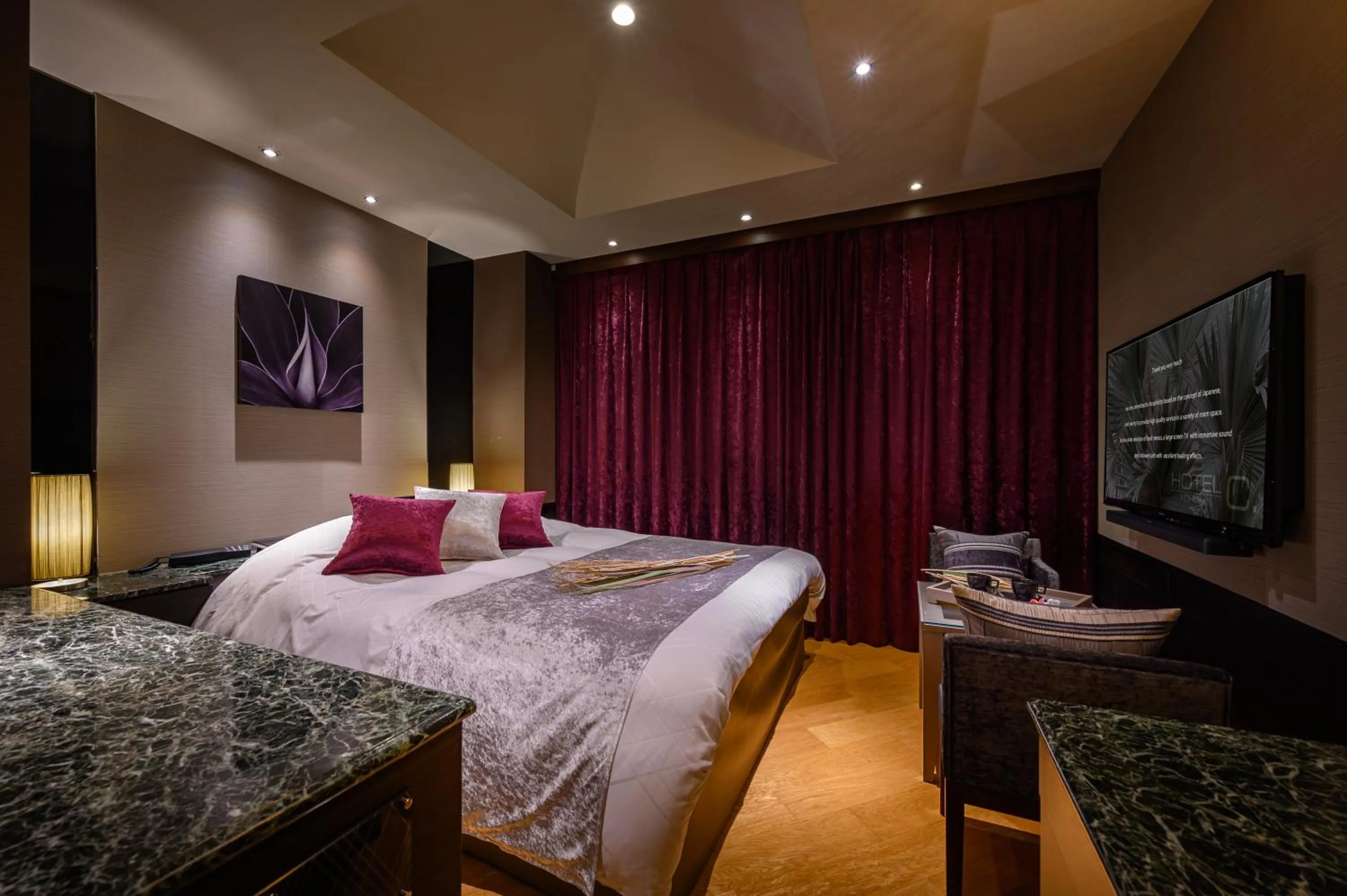 Bed in HOTEL C.KOHOKU