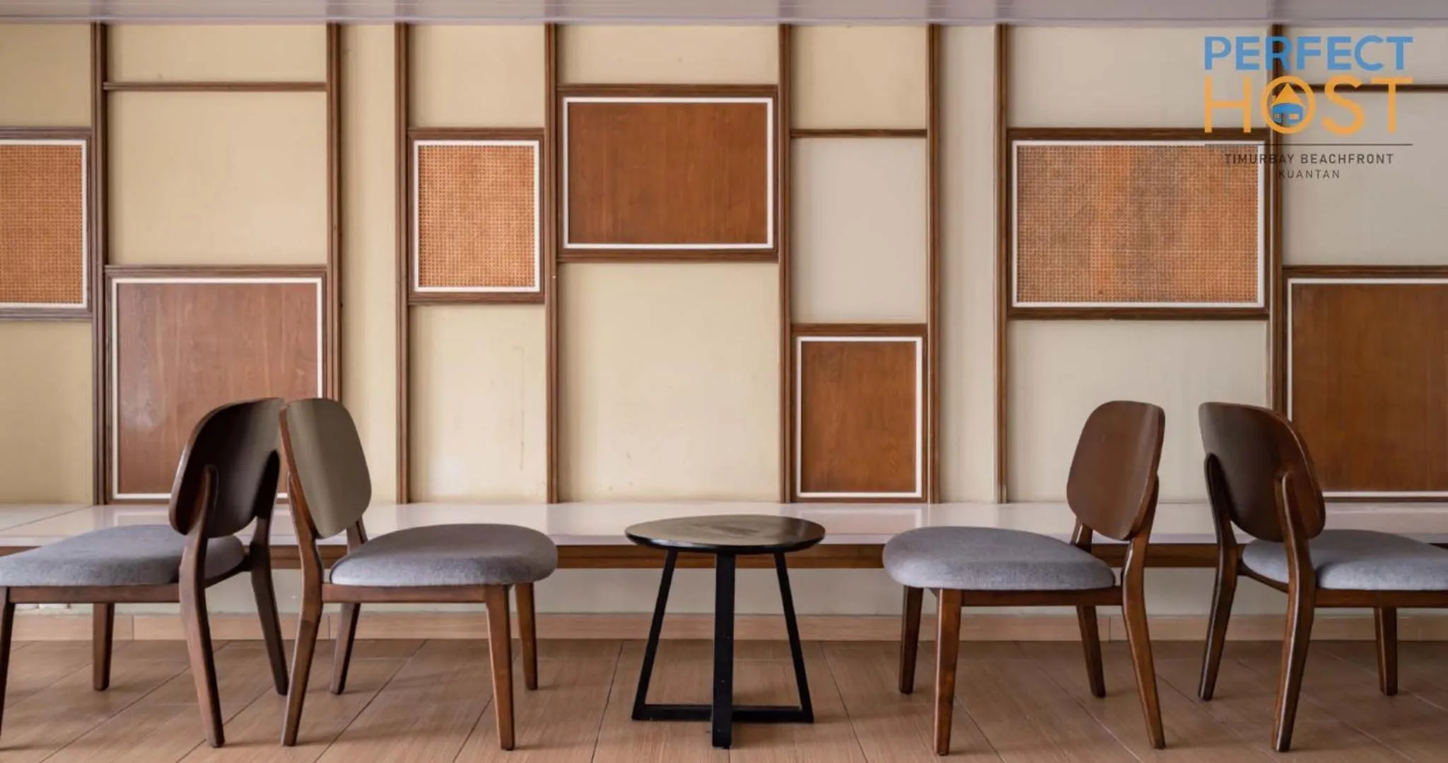 Seating area in Timurbay Beachfront by Perfect Host