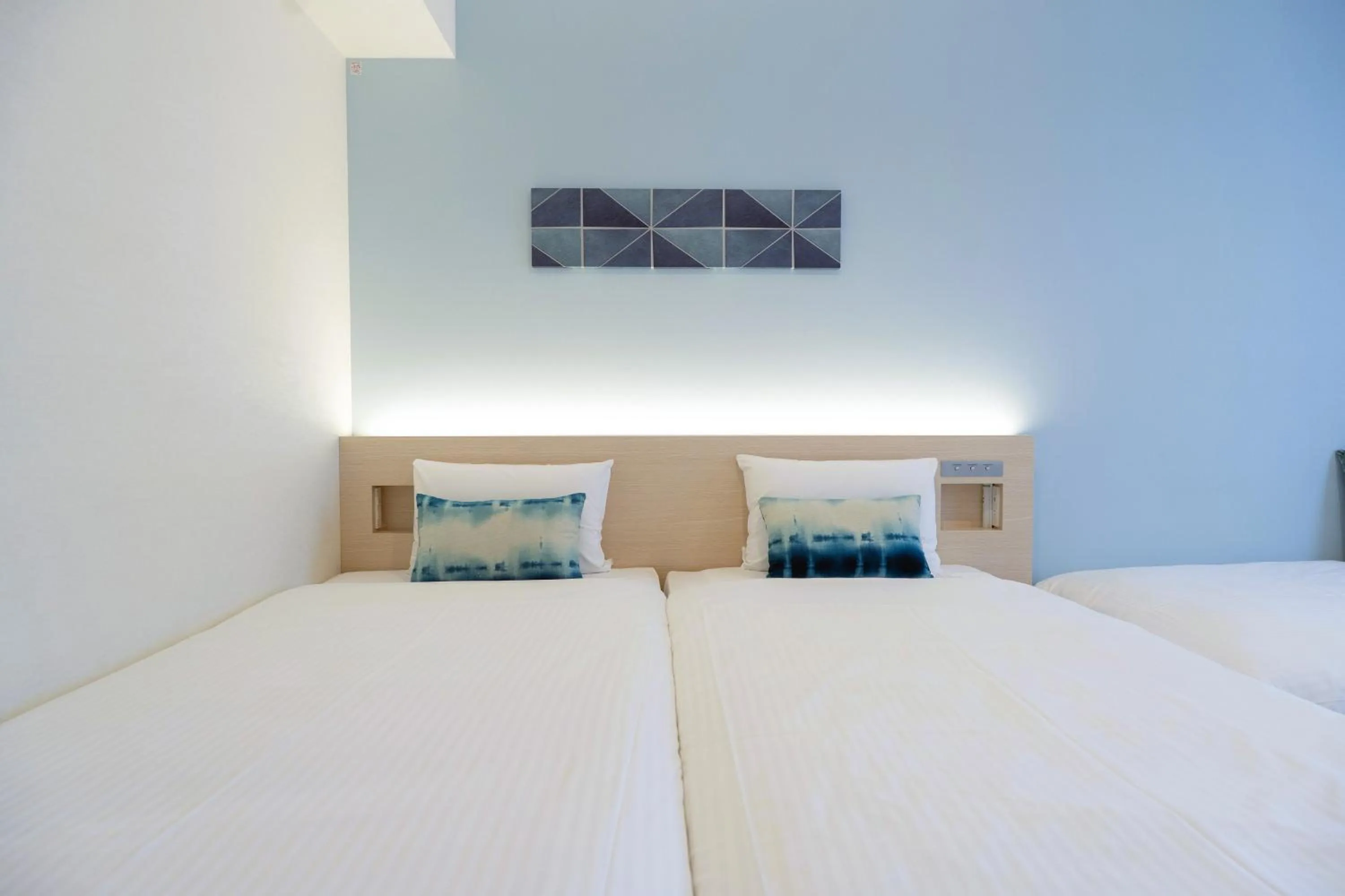 Bed in Hotel Torifito Miyakojima Resort