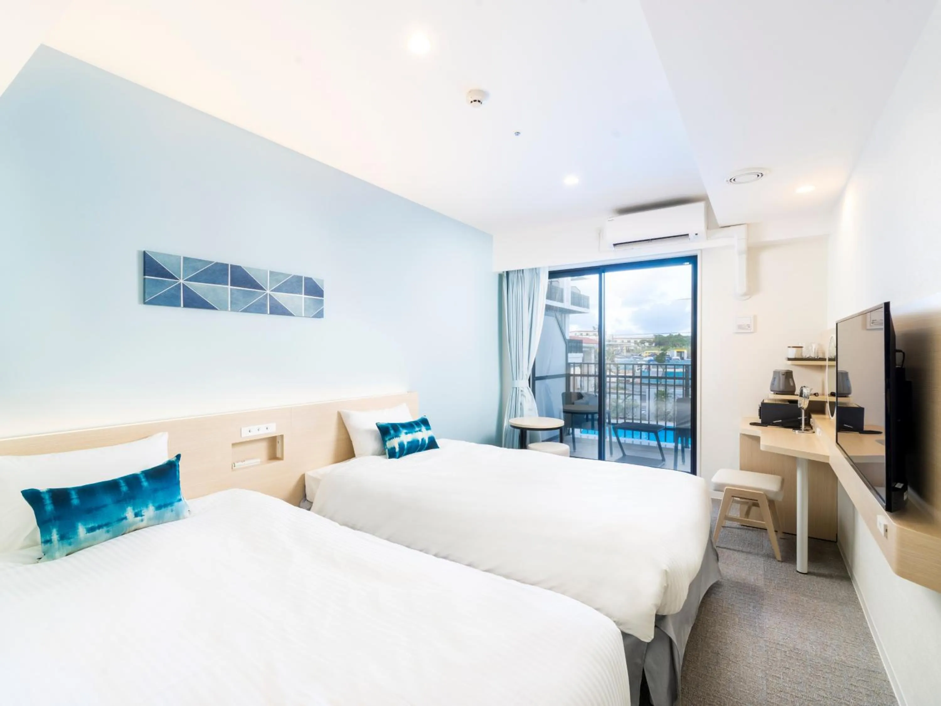 Bed in Hotel Torifito Miyakojima Resort