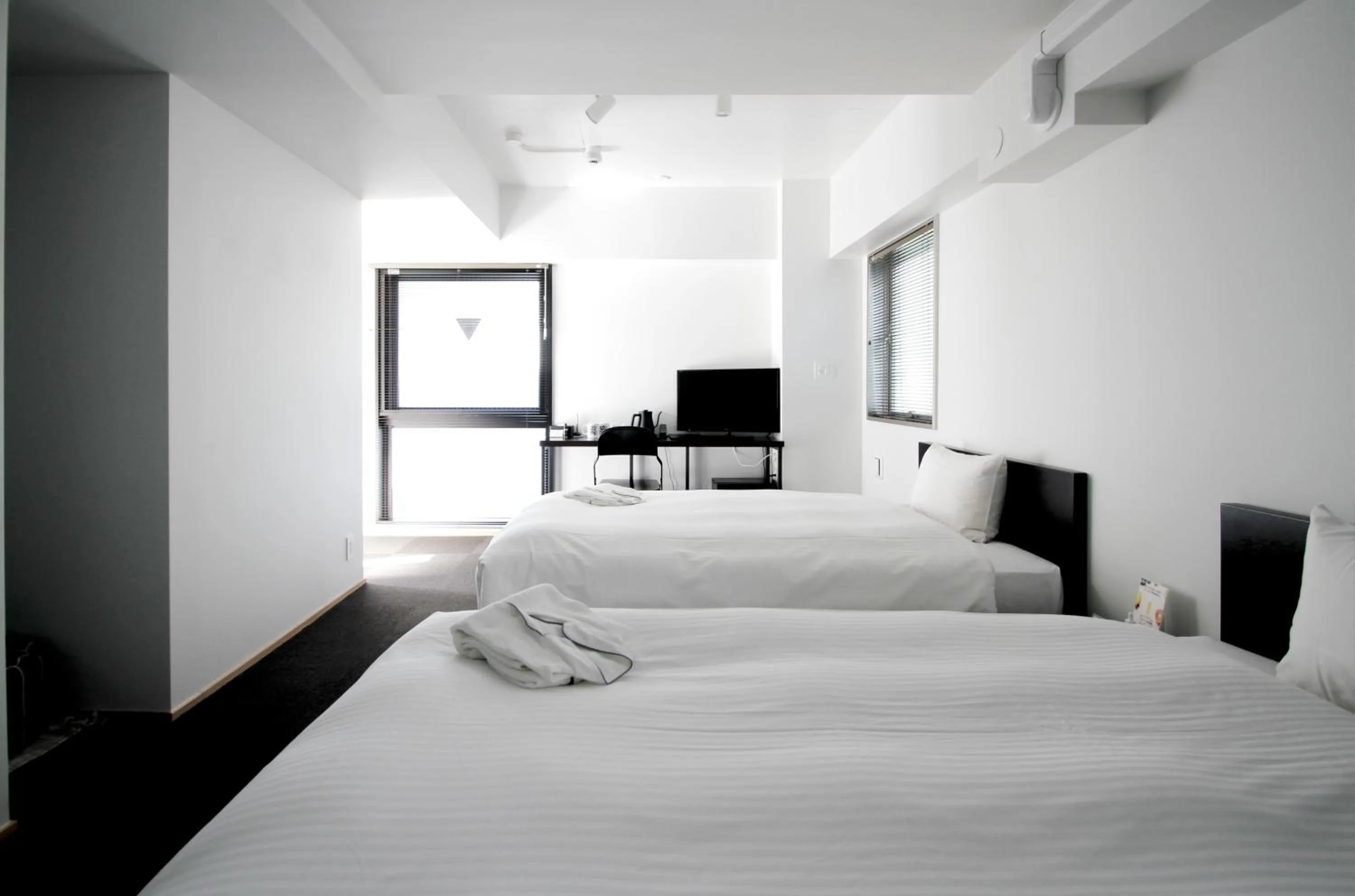 Bed in 8HOTEL Chigasaki