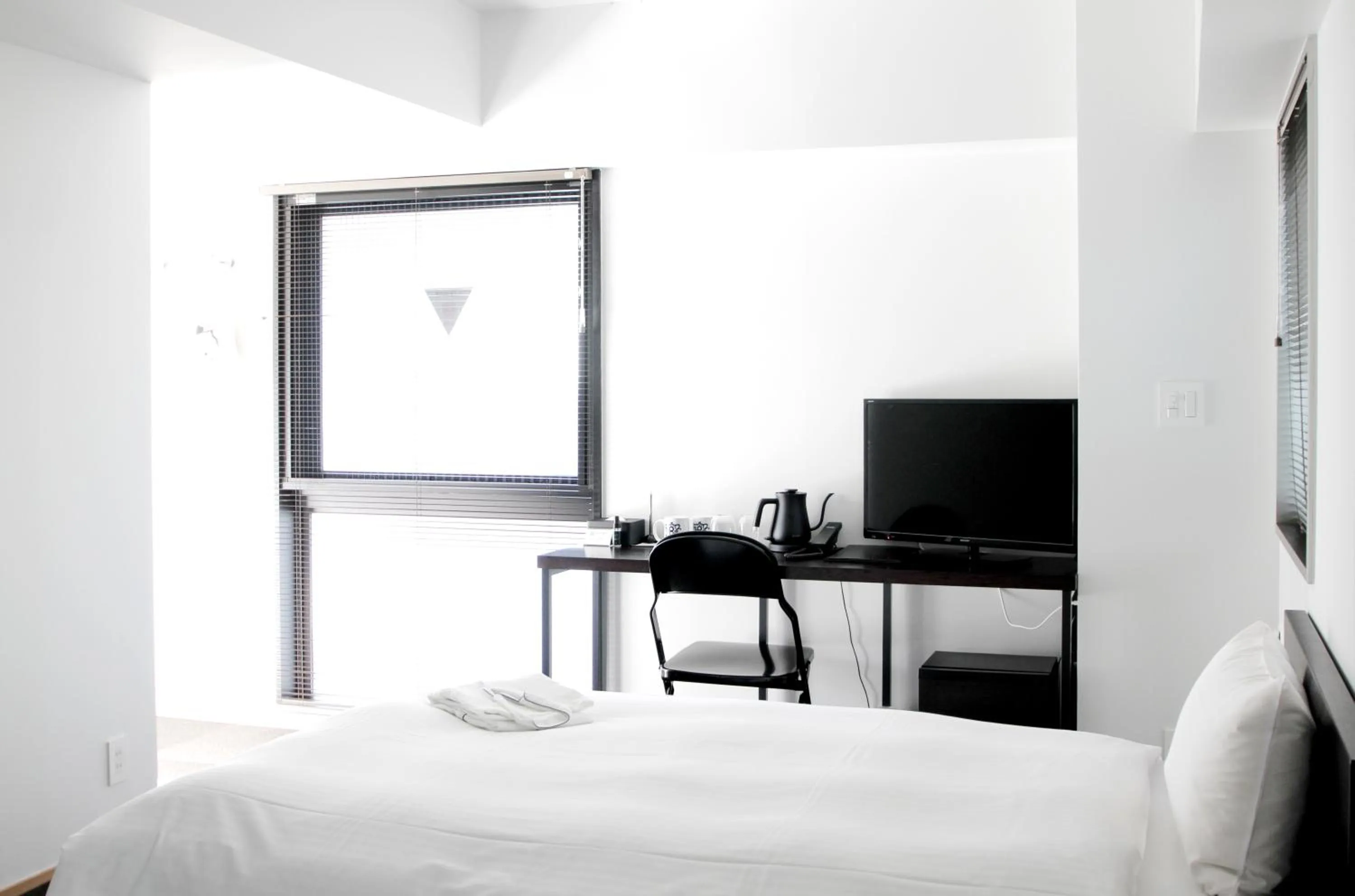 Bed in 8HOTEL Chigasaki