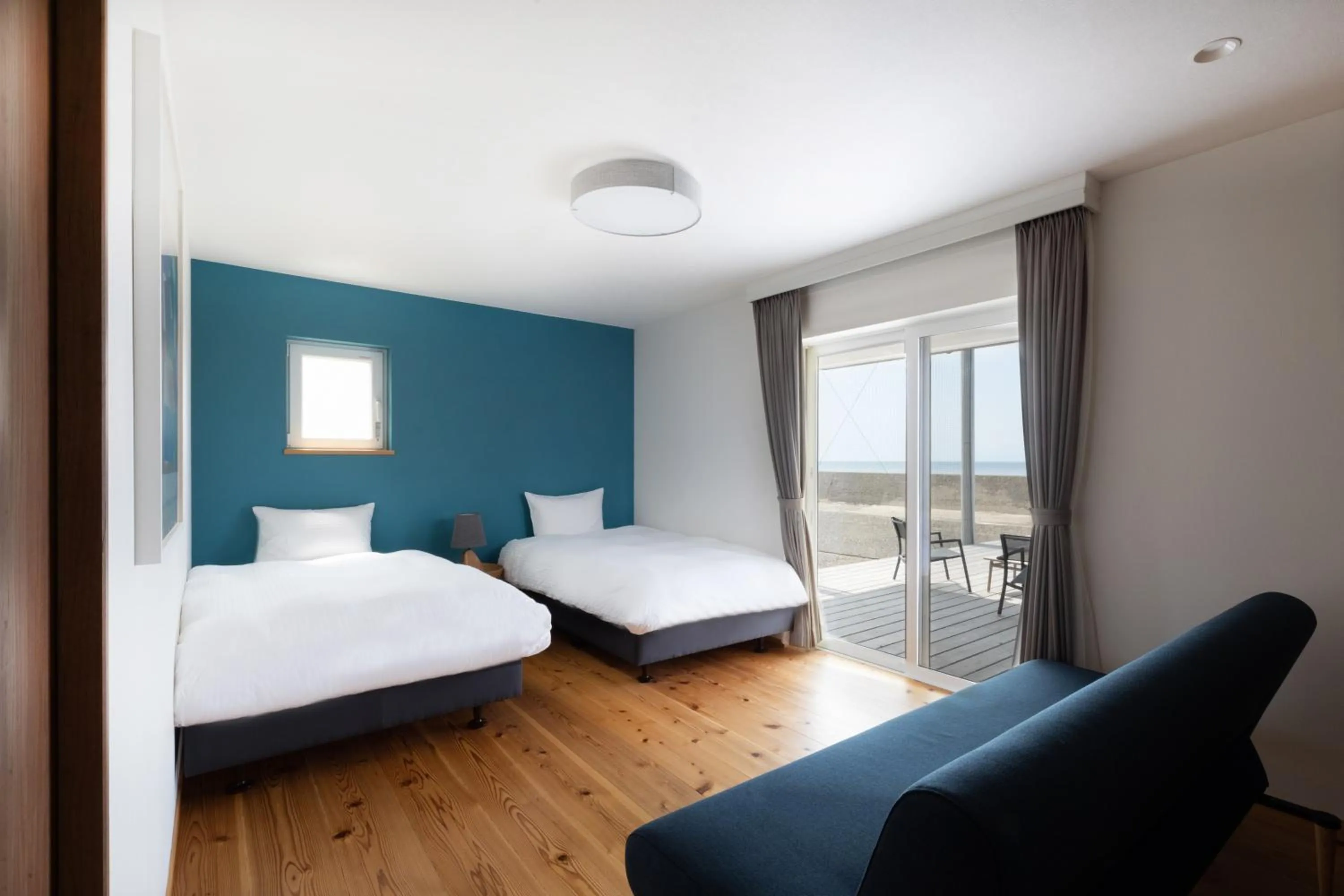 Bed in KAMOME SLOW HOTEL