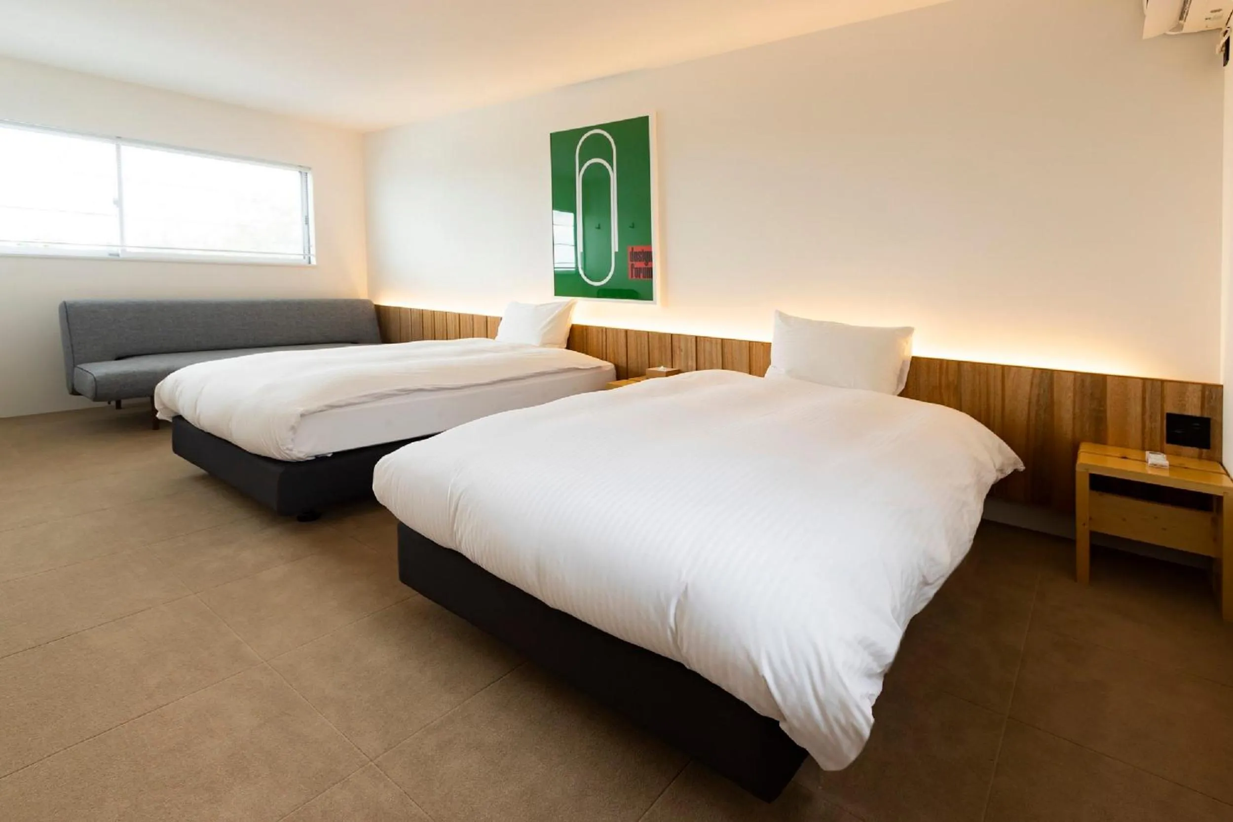 Bed in KAMOME SLOW HOTEL