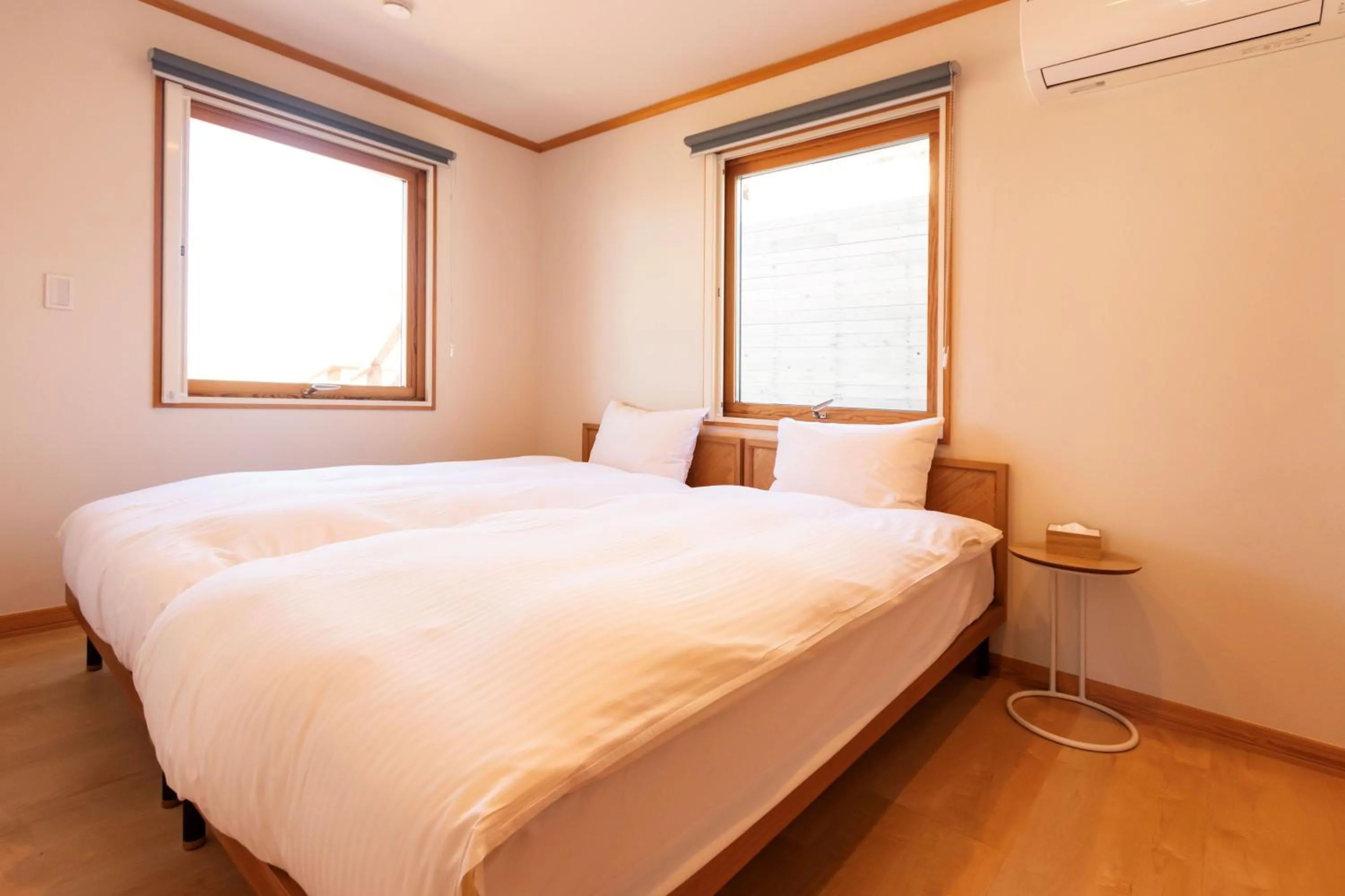 Bed in KAMOME SLOW HOTEL