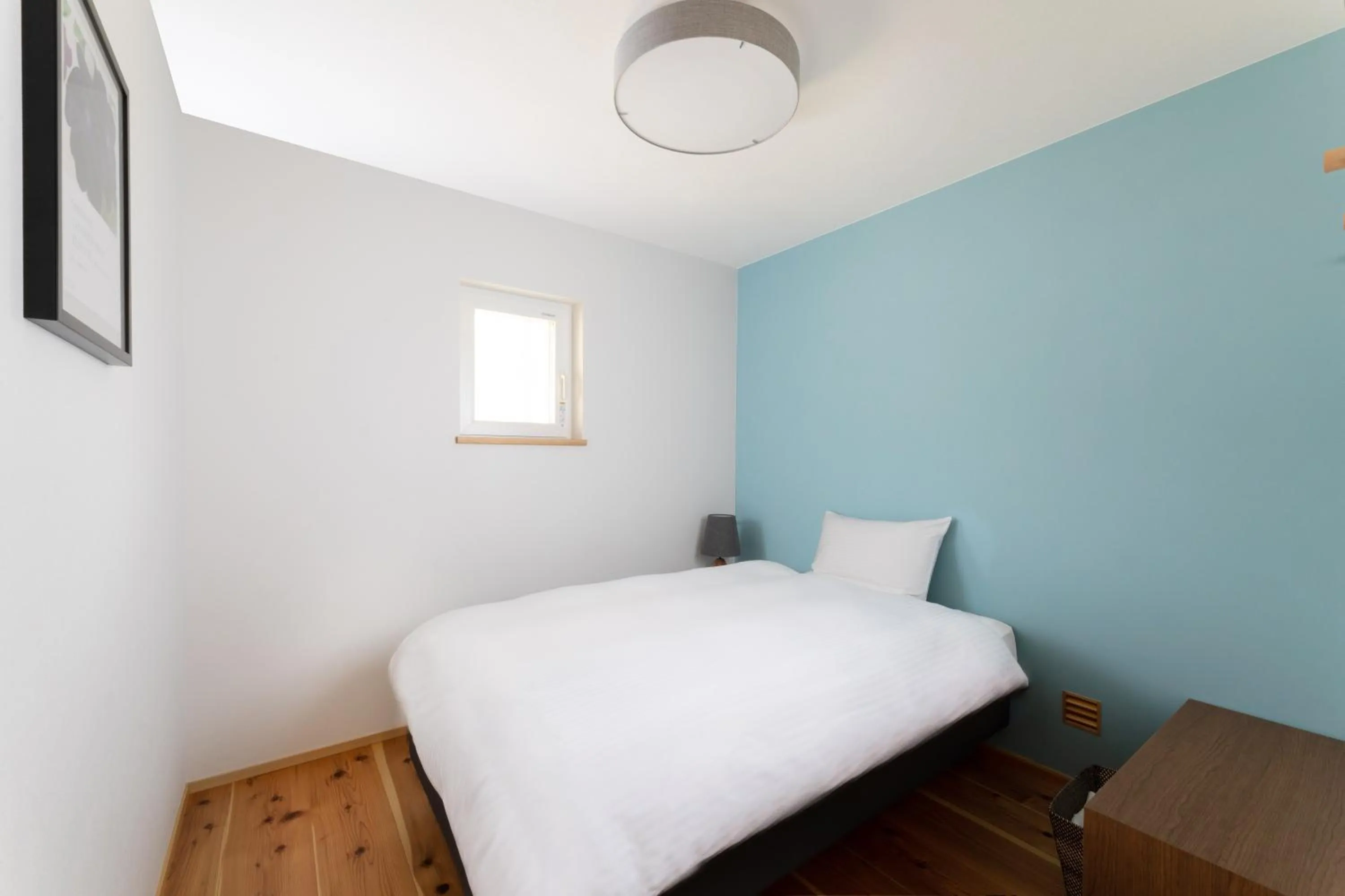 Bed in KAMOME SLOW HOTEL