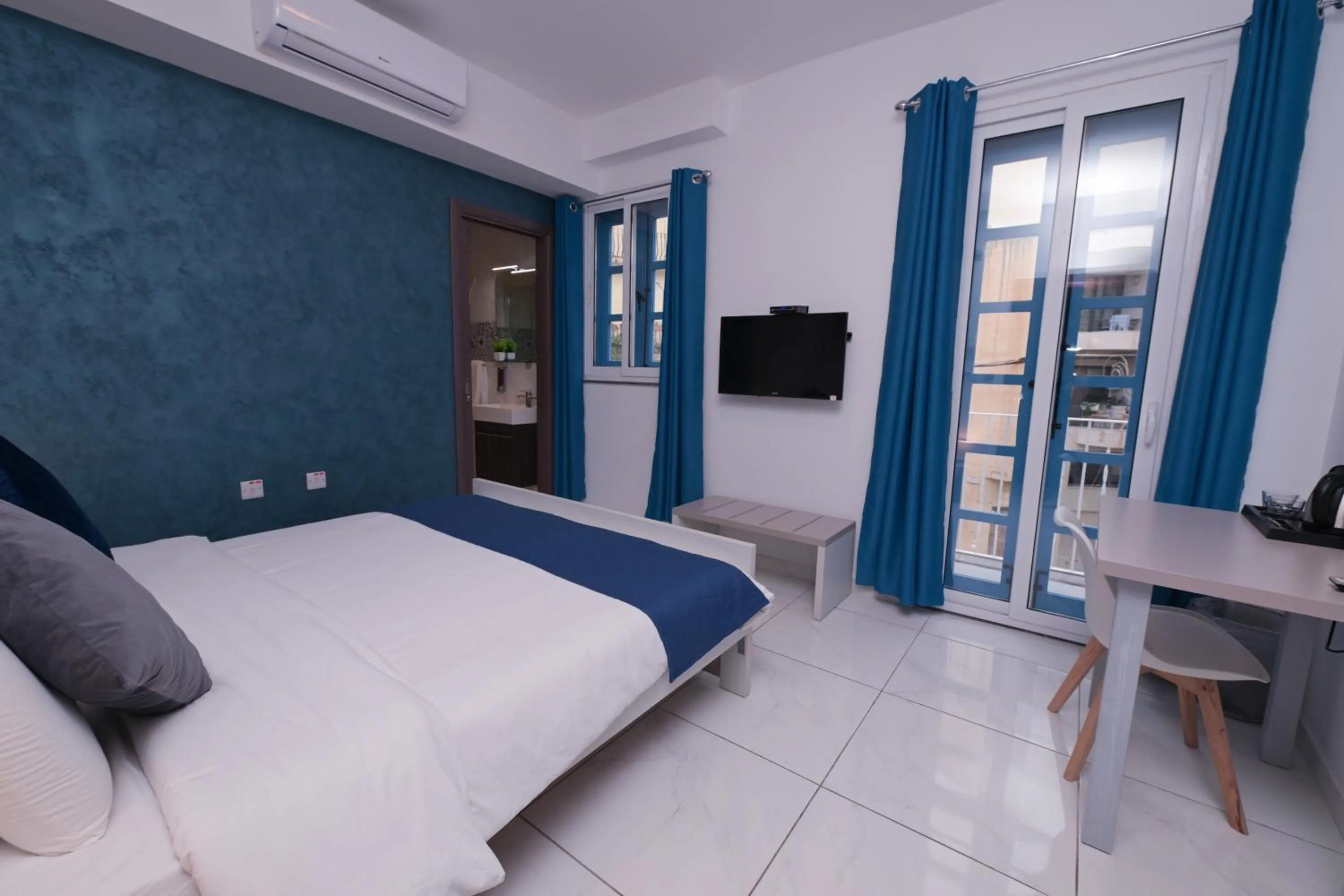 Bed in The Exiles Hotel