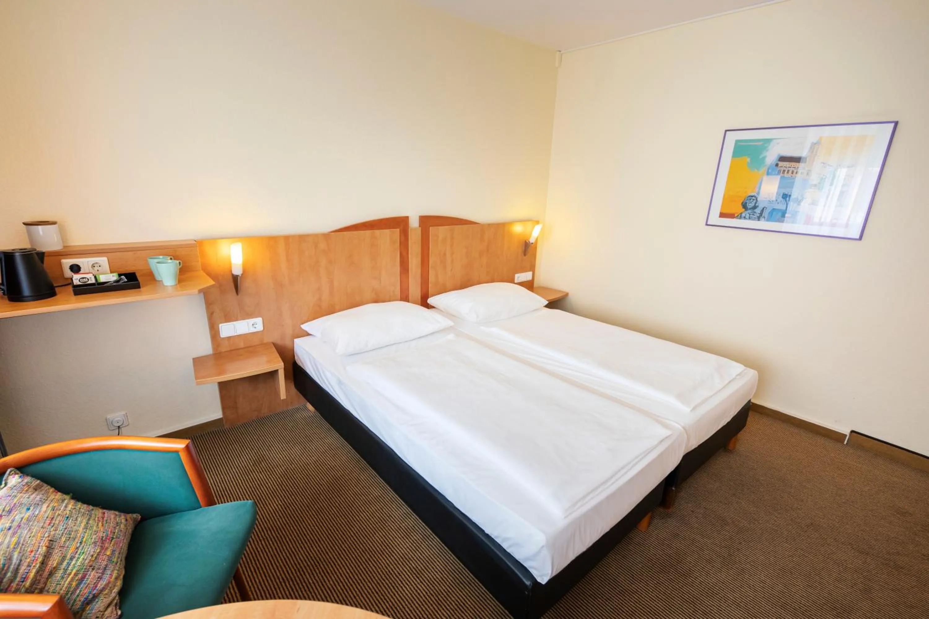 Photo of the whole room, Bed in ACHAT Hotel Braunschweig