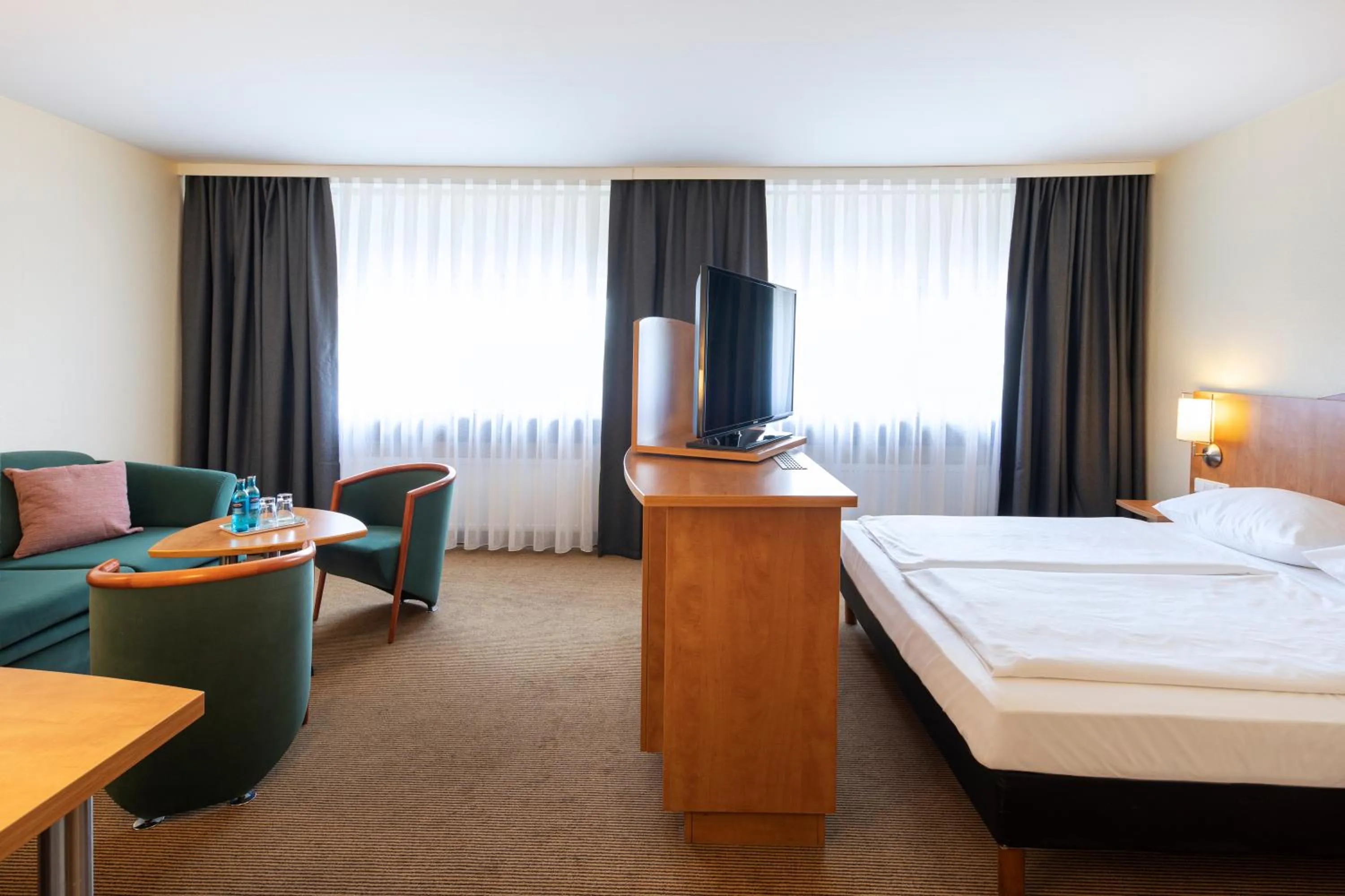 Photo of the whole room, Bed in ACHAT Hotel Braunschweig