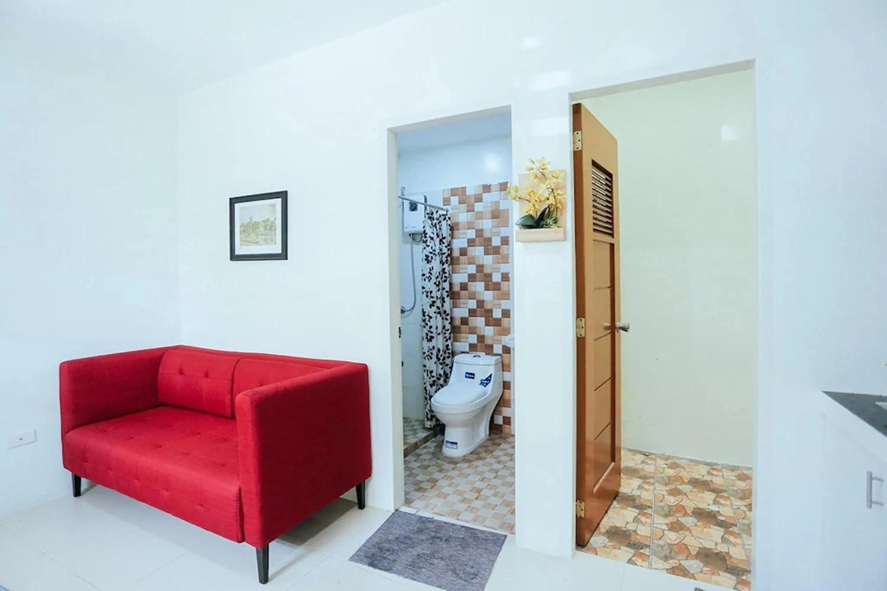 Seating area in LJENJ Apartelle near Clark Airport