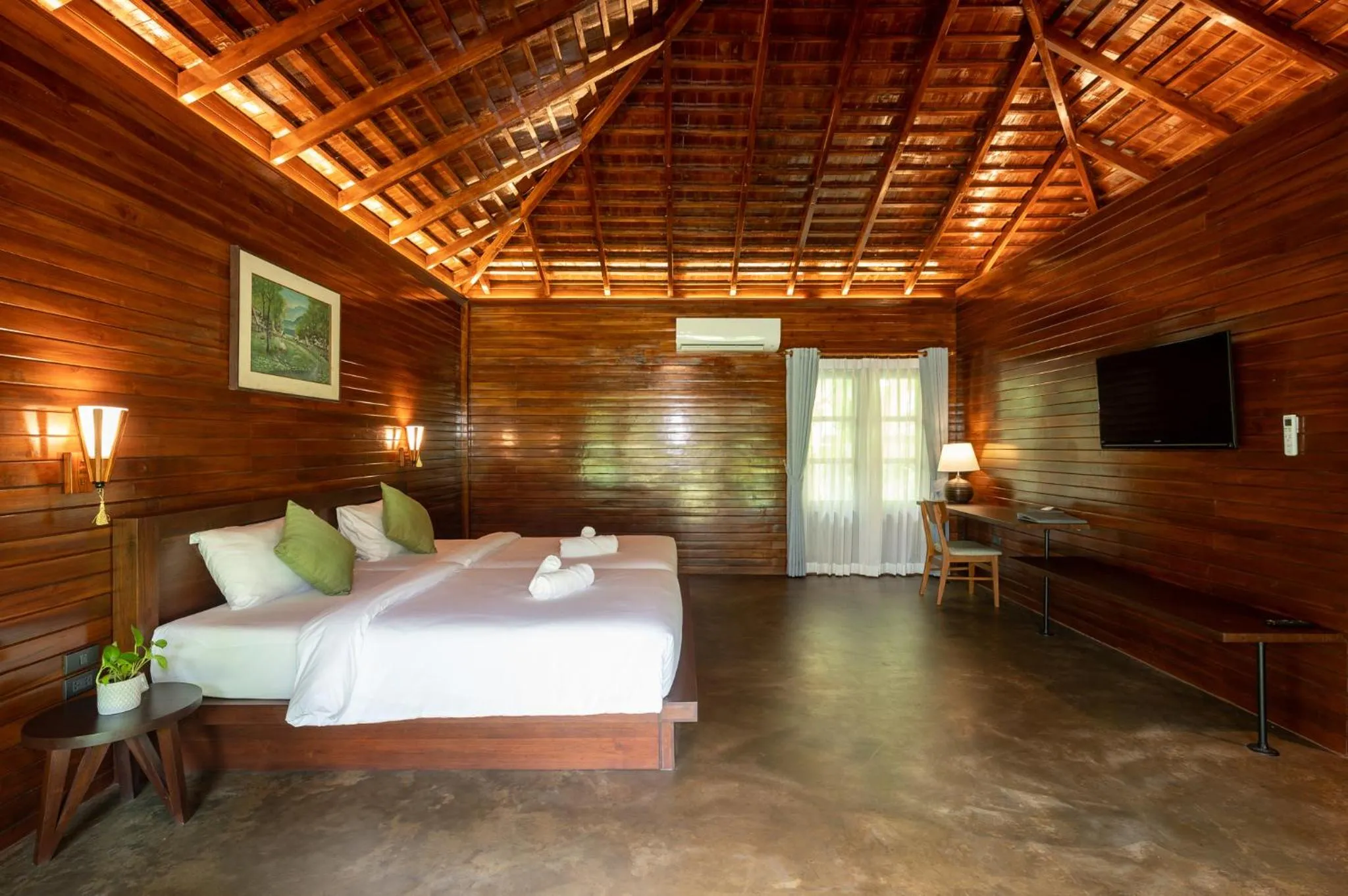 Photo of the whole room, Bed in Phumontra Resort Nakhon Nayok