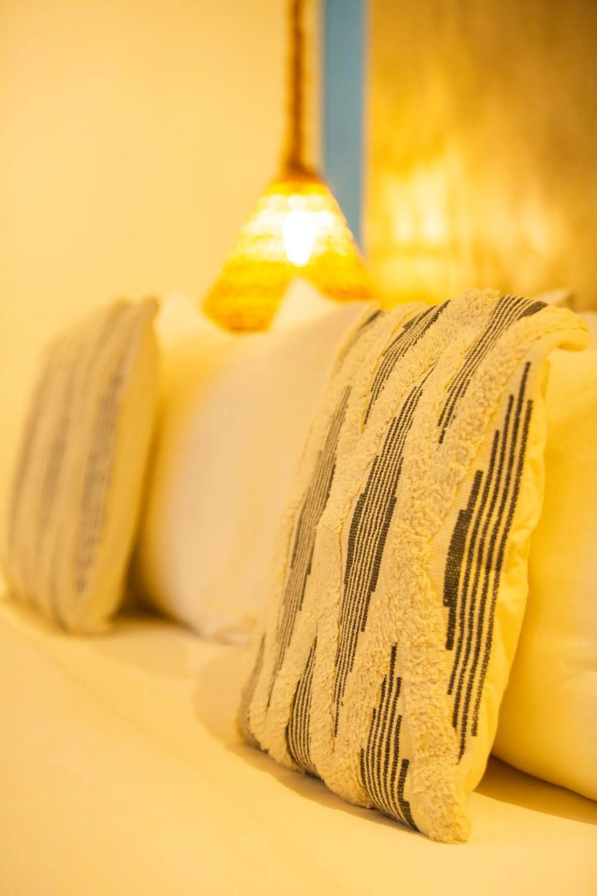 Bed in ANGKLA Beach Club & Boutique Resort