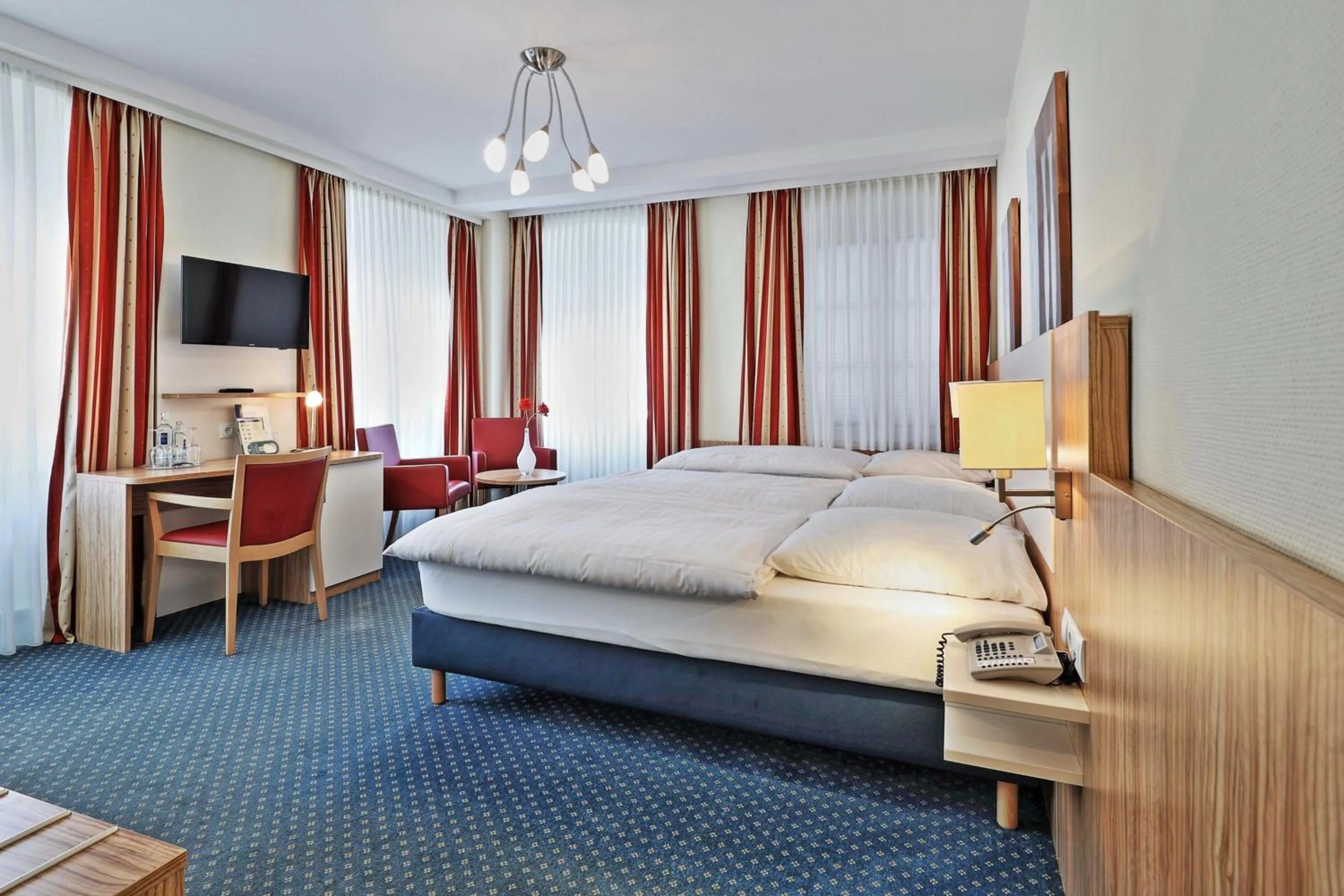 Photo of the whole room, Bed in Hotel Trierer Hof