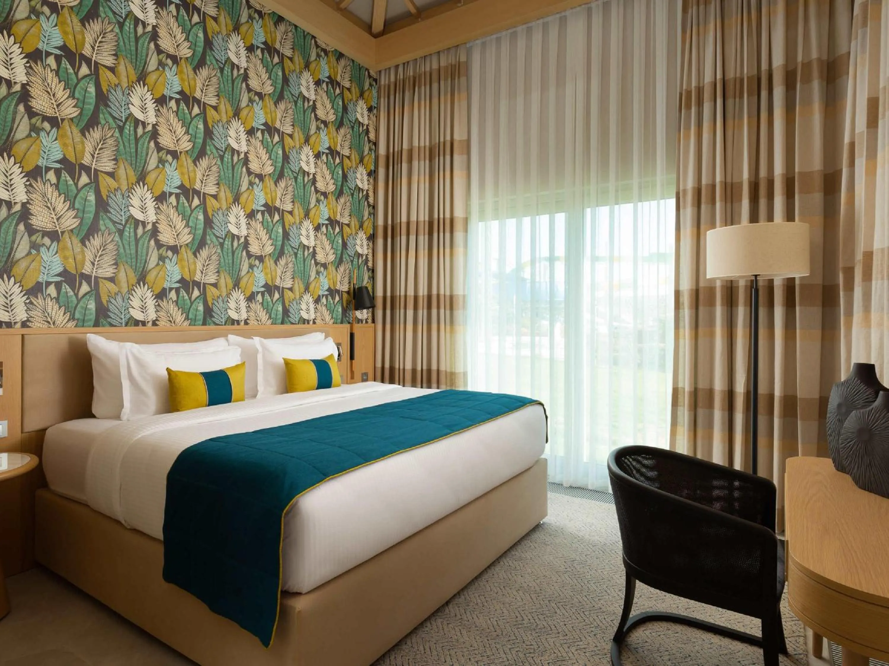 Bedroom, Bed in Rixos Water World Aktau - Theme Park Free Access