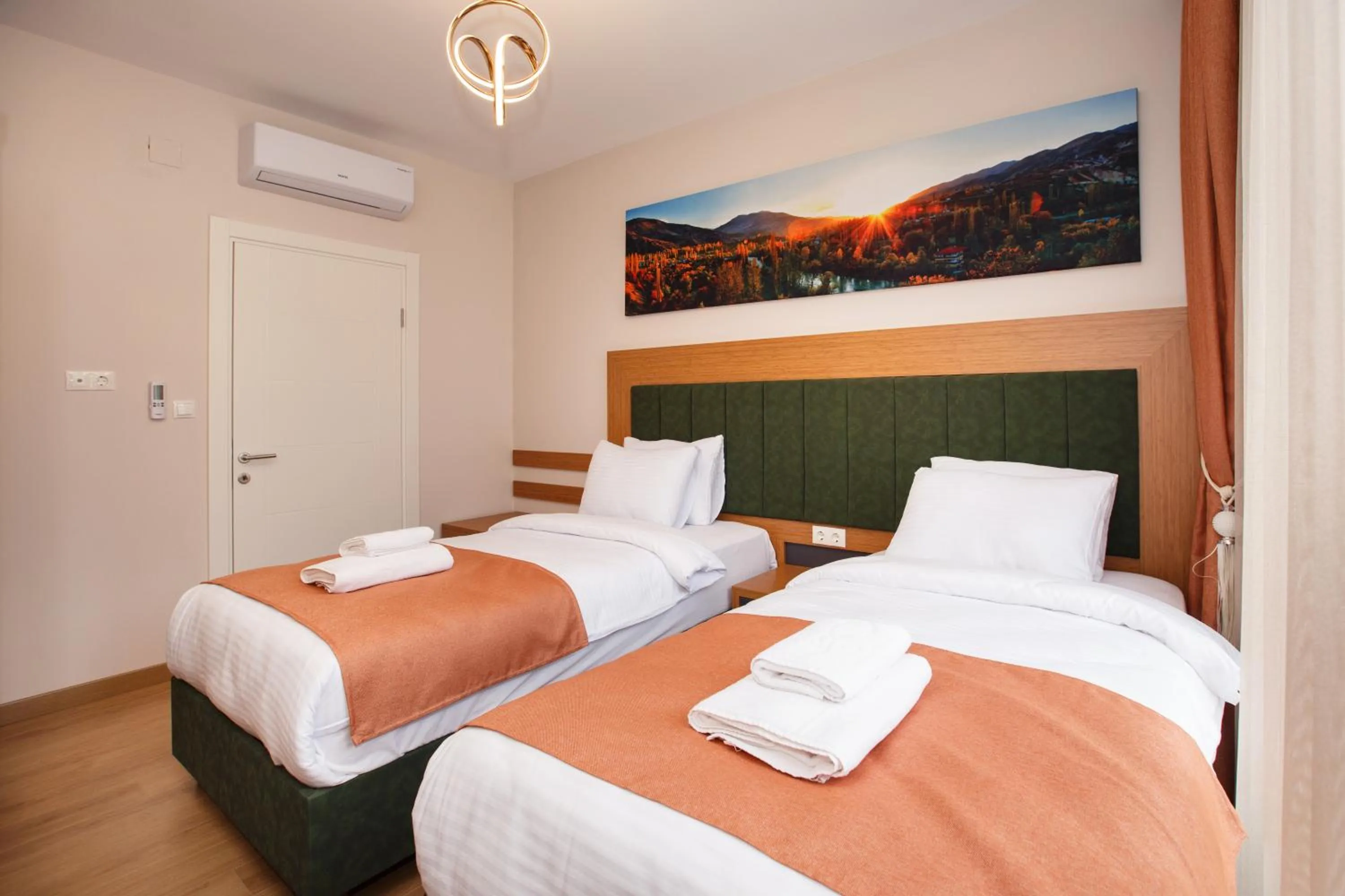 Living room, Bed in Armoni Deluxe Suites Trabzon