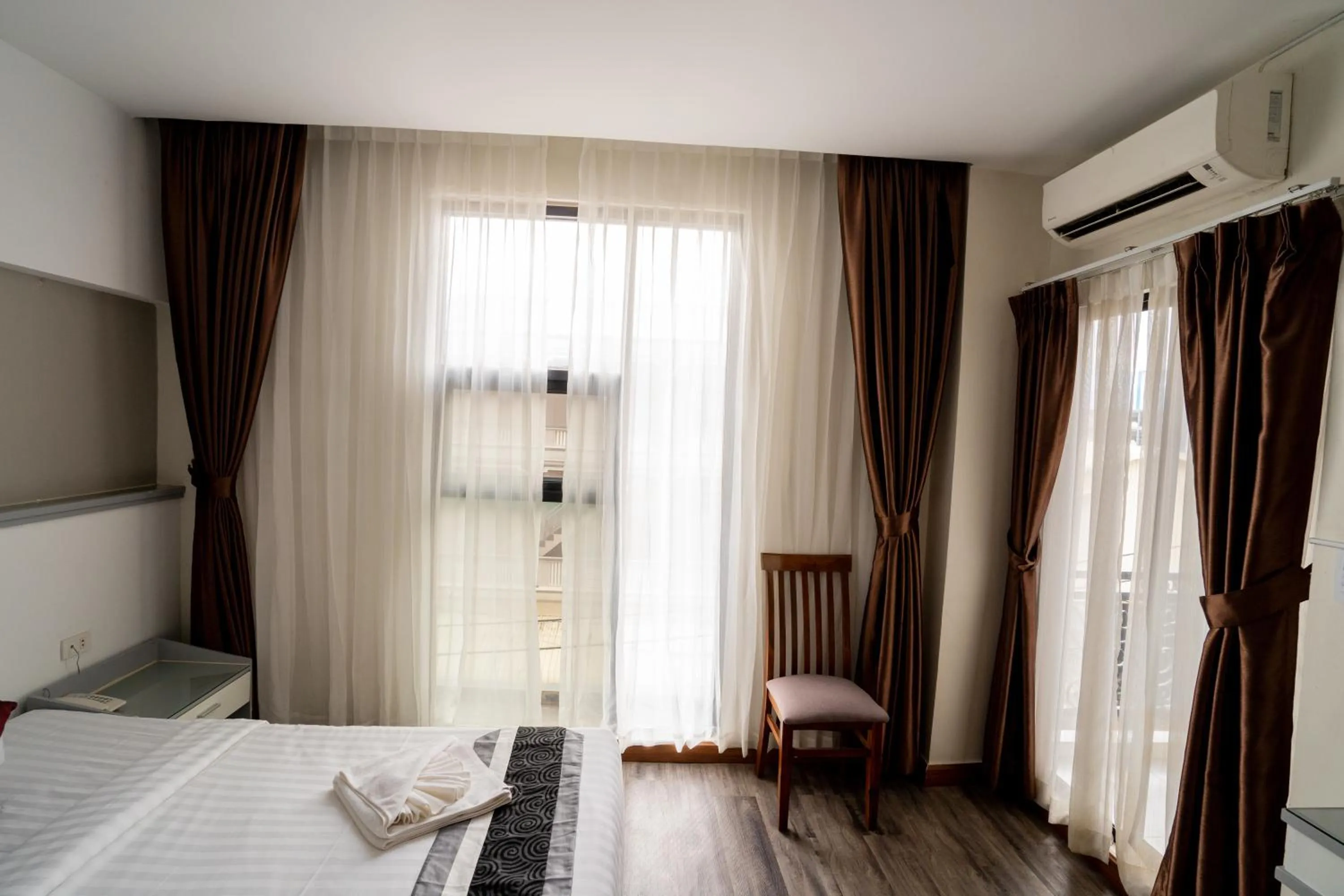 Bed in Hak Heng Hotel