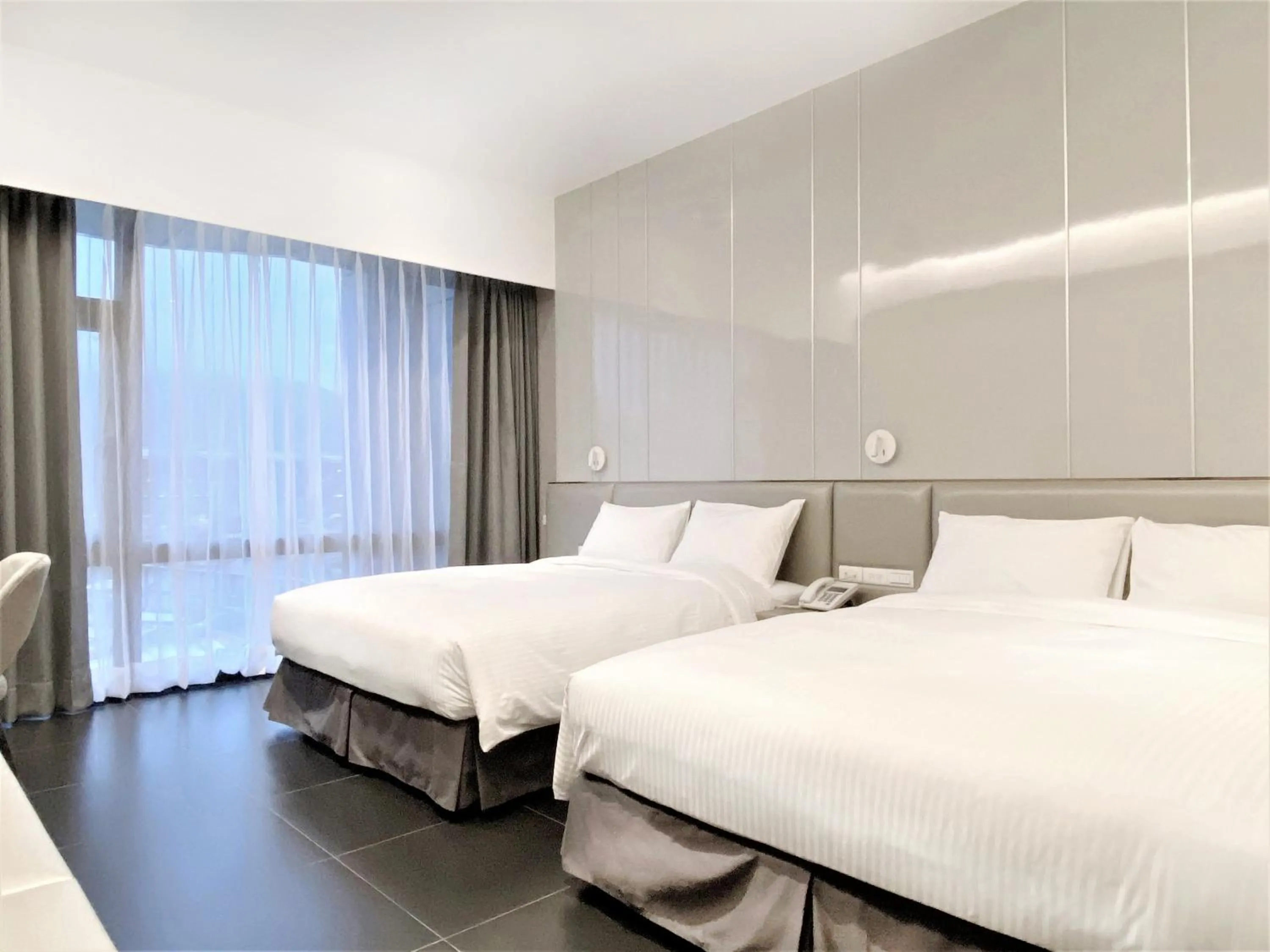 Bed in Champ De Rose Hotel