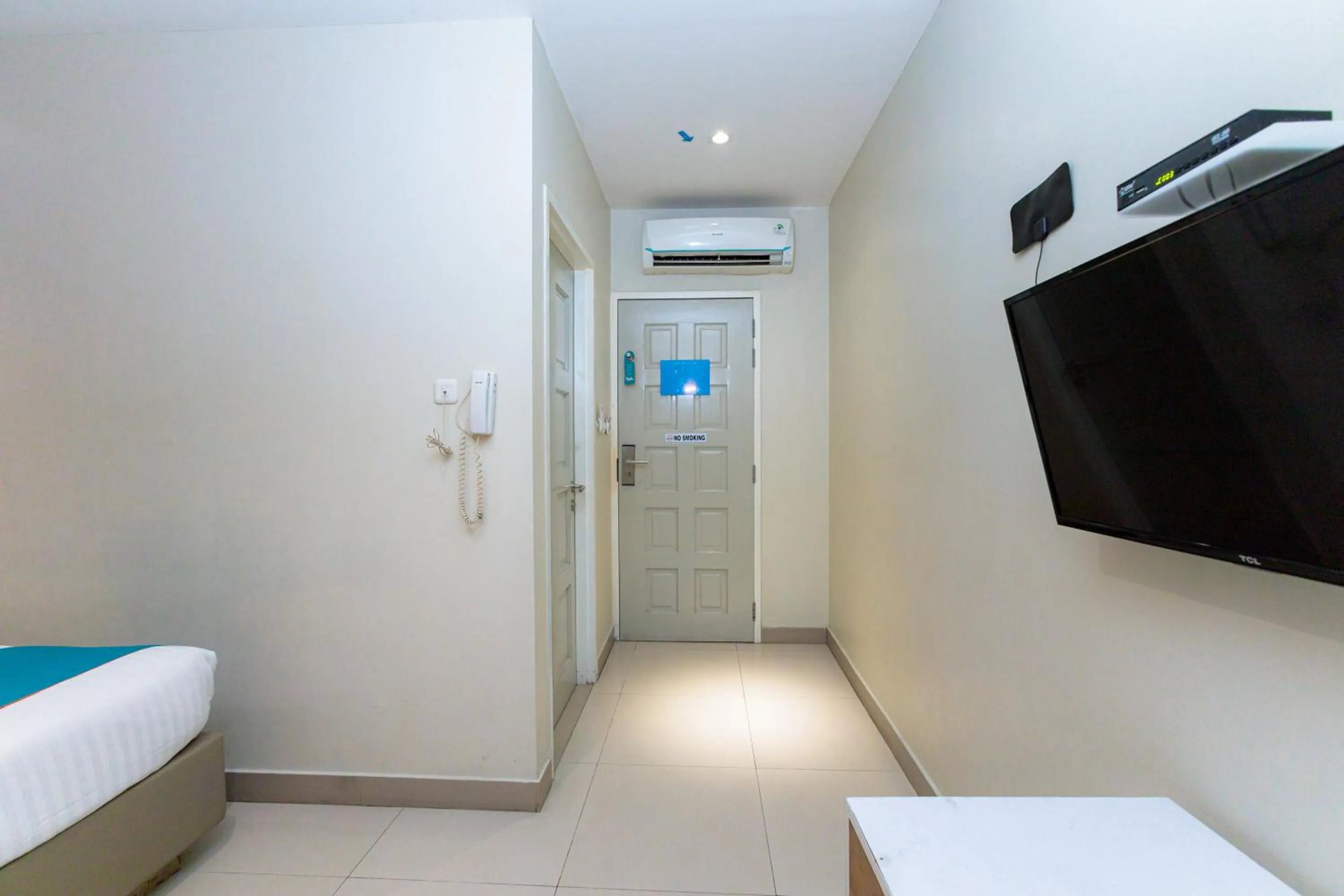 Bedroom, Bed in Sans Hotel Liv Ancol by RedDoorz