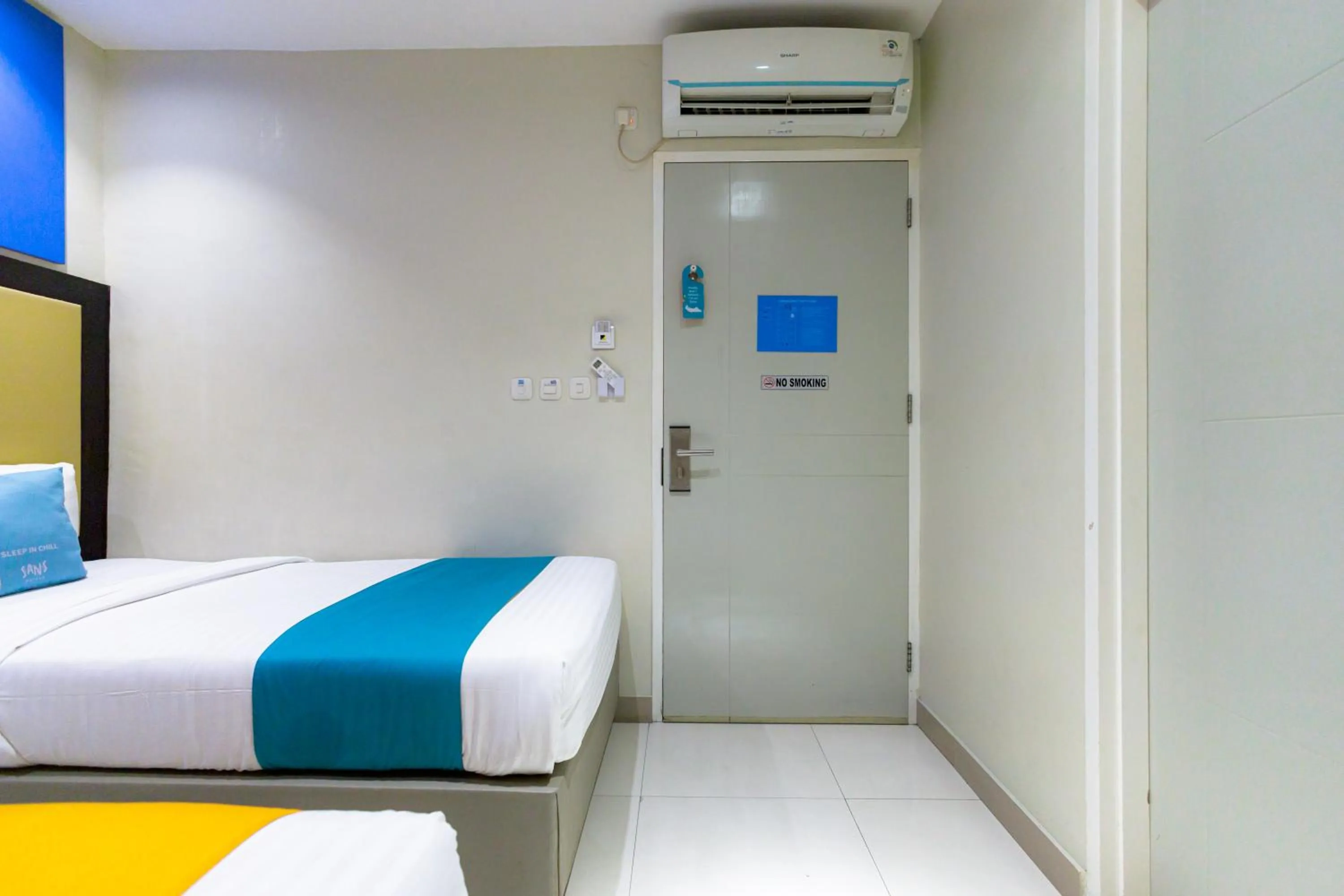 Bedroom, Bed in Sans Hotel Liv Ancol by RedDoorz