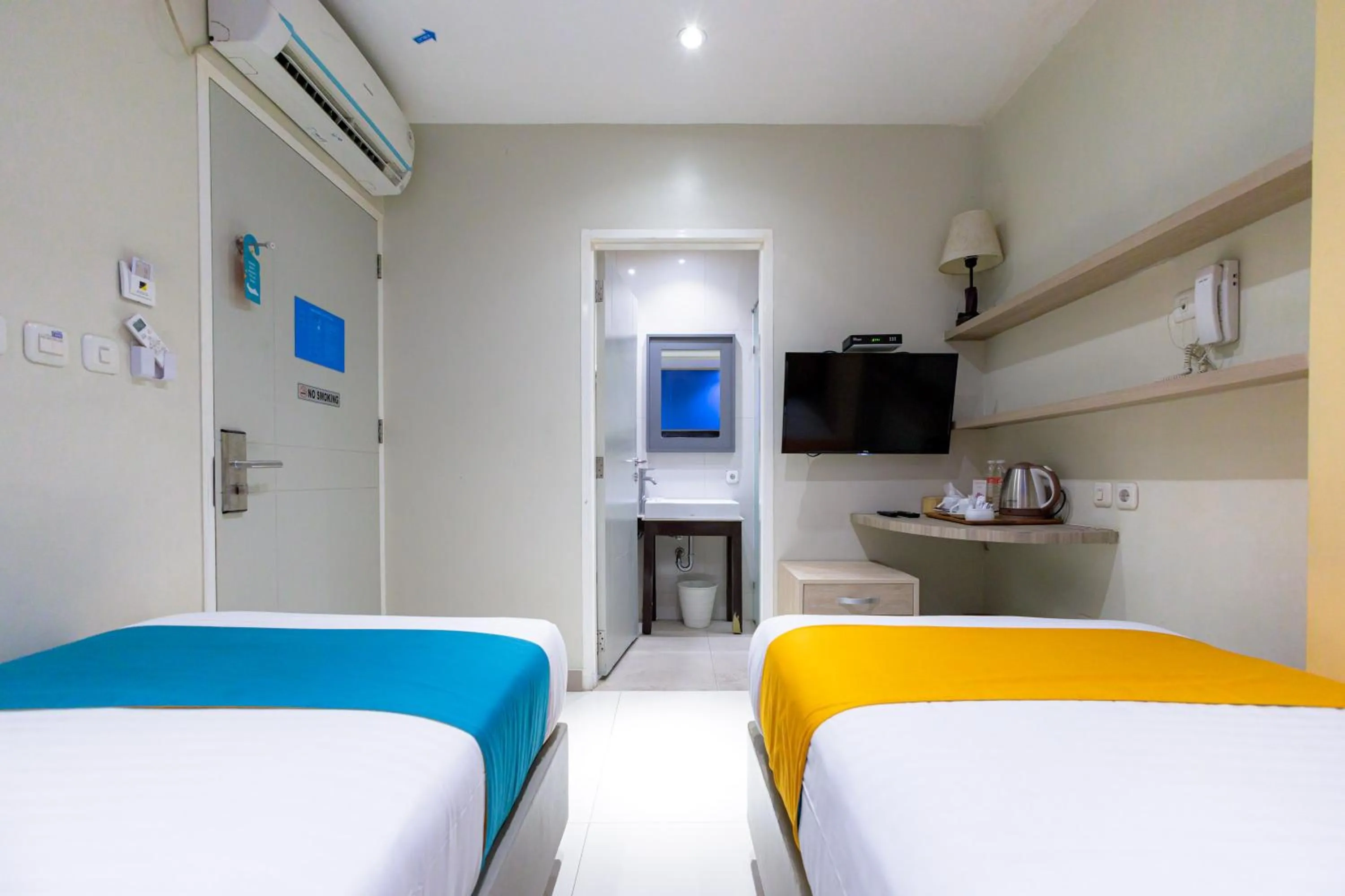 Bedroom, Bed in Sans Hotel Liv Ancol by RedDoorz